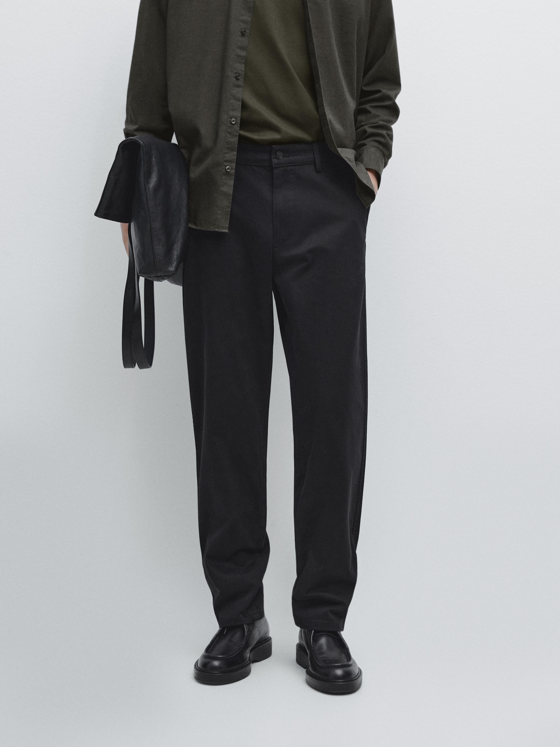 Pantaloni tapered fit smerigliati