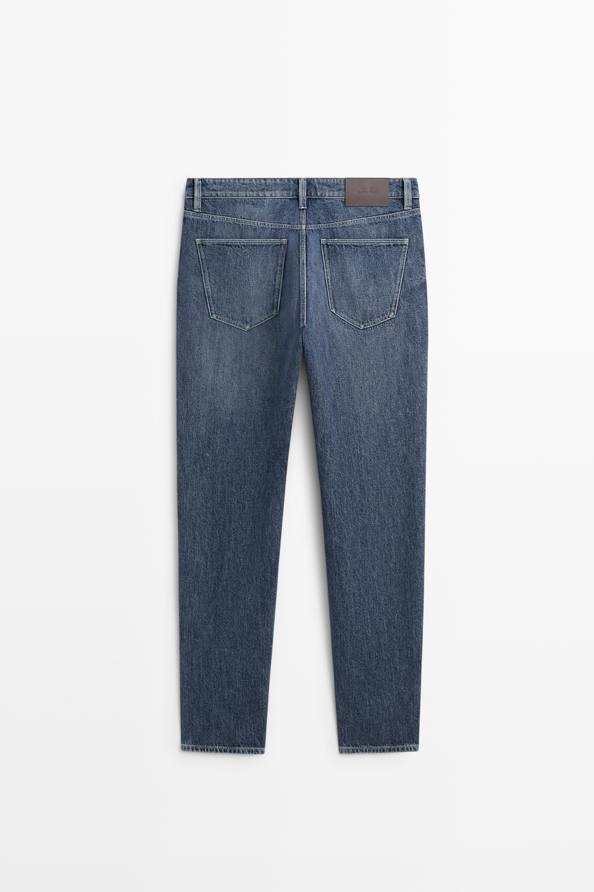 Enzymatic tapered fit jeans — INDIGO