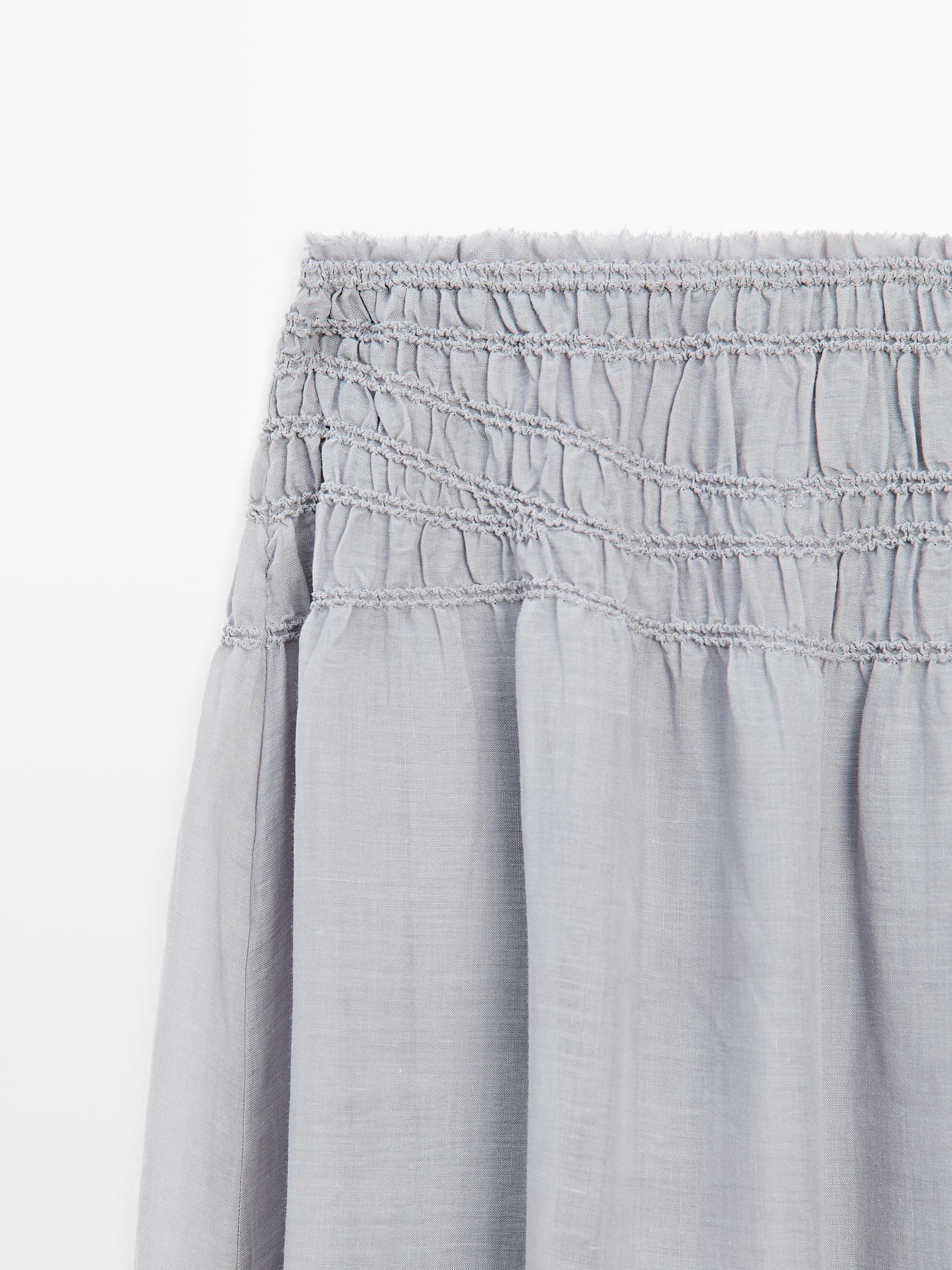 Long flowing skirt with gathered detail · Blue · Sunglasses Long flowing skirt with gathered detail · Blue · Sunglasses