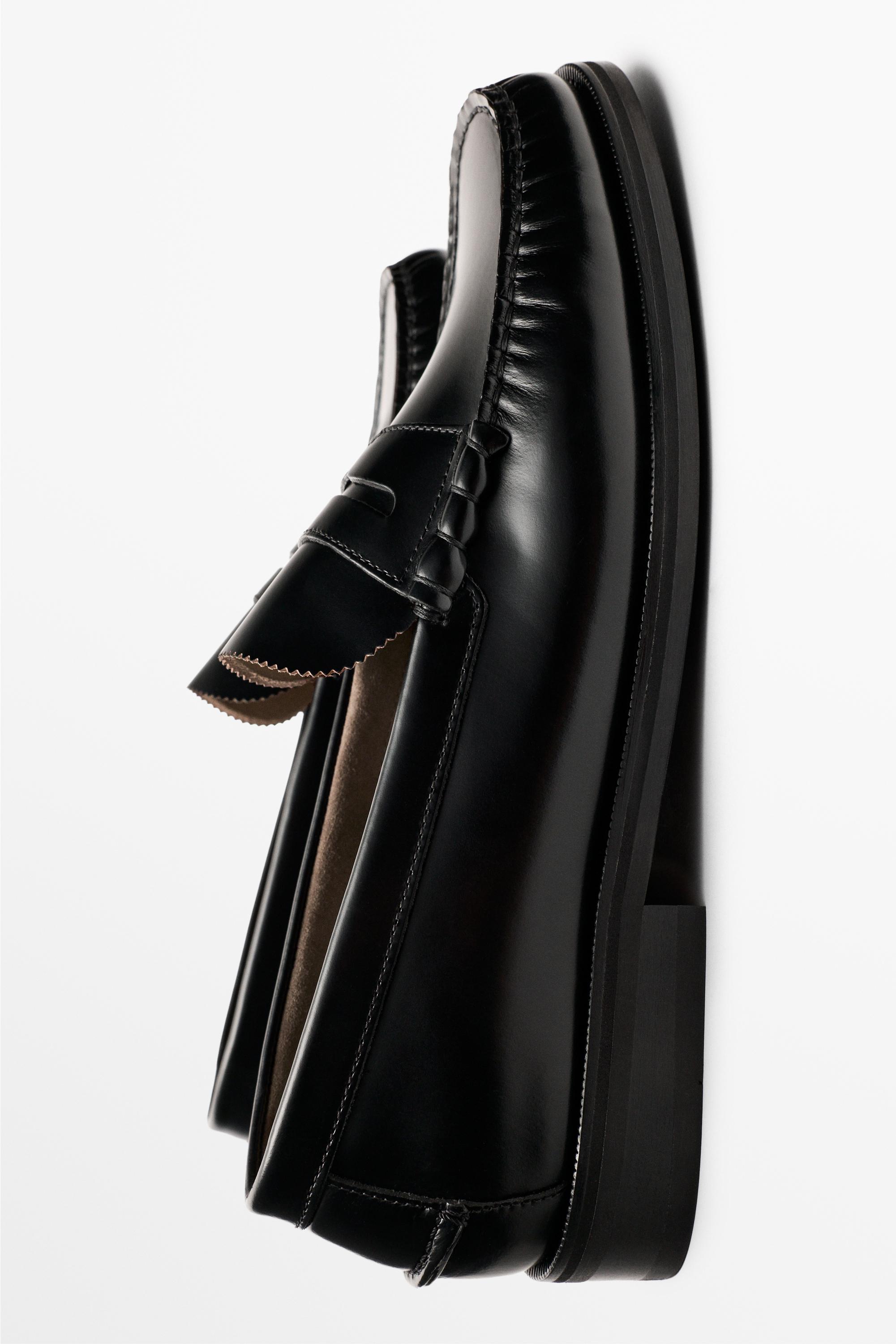 Leather penny loafer — BLACK
