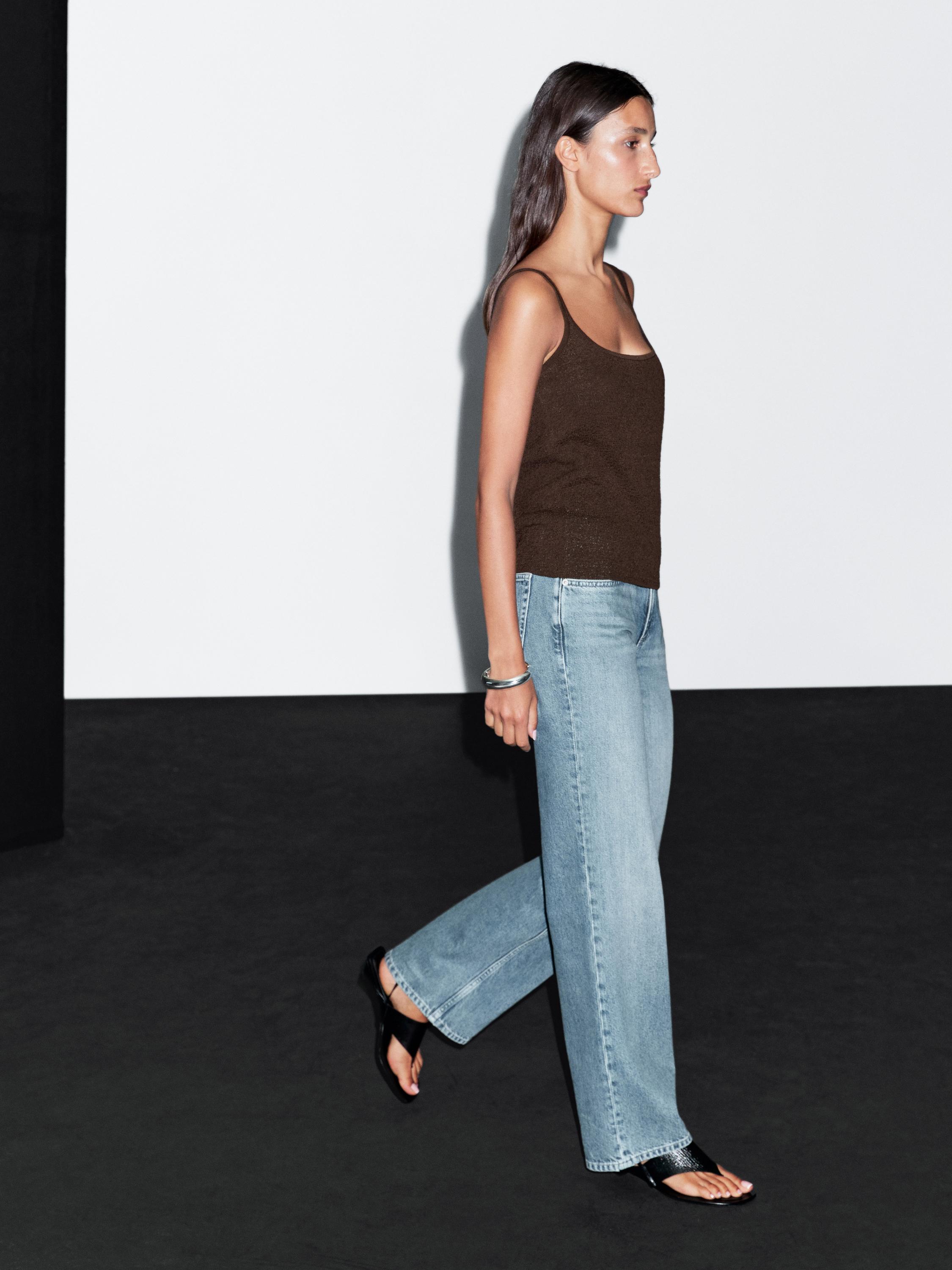 Flowing knit top with straps