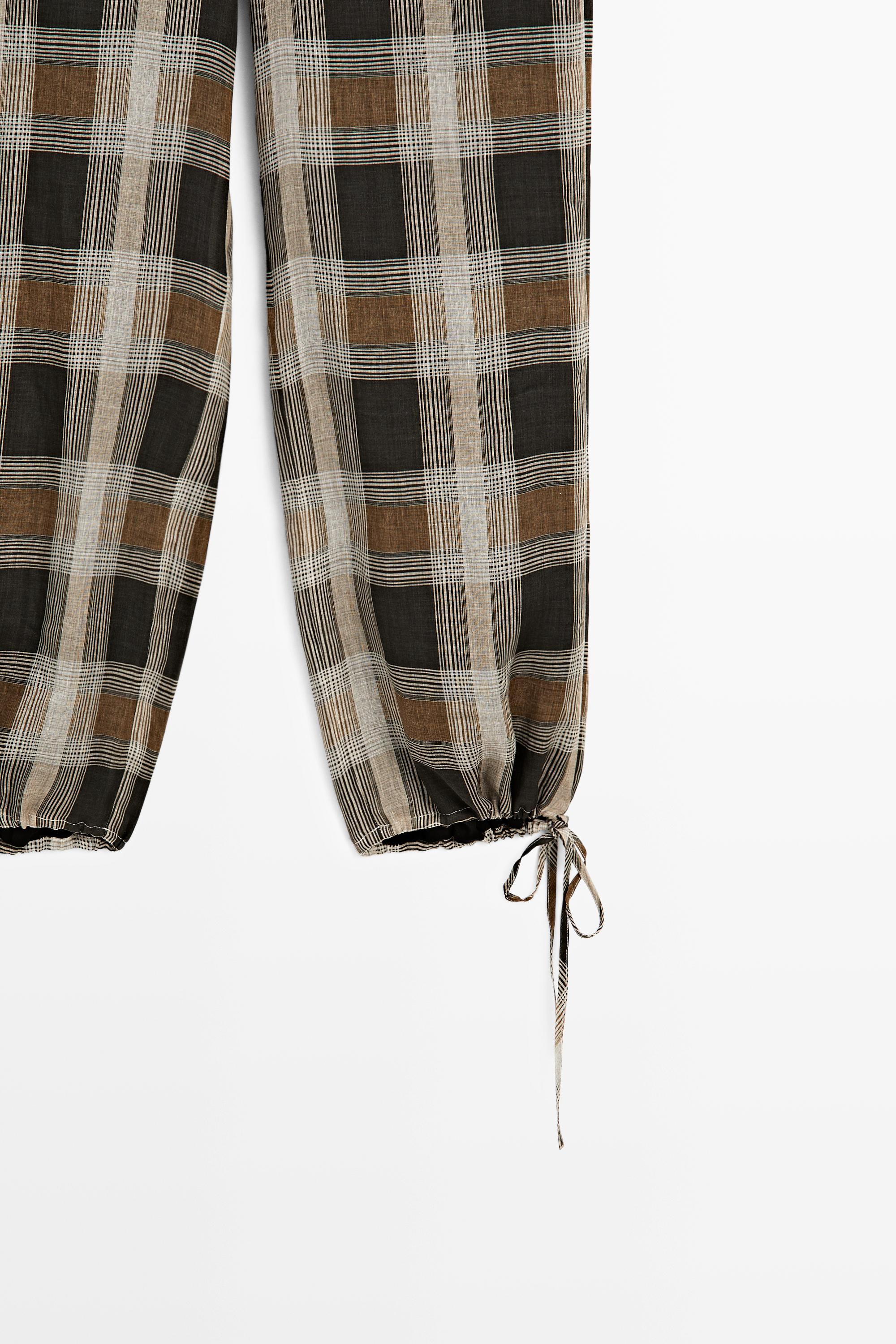 Check print sarouel trousers — BLACK