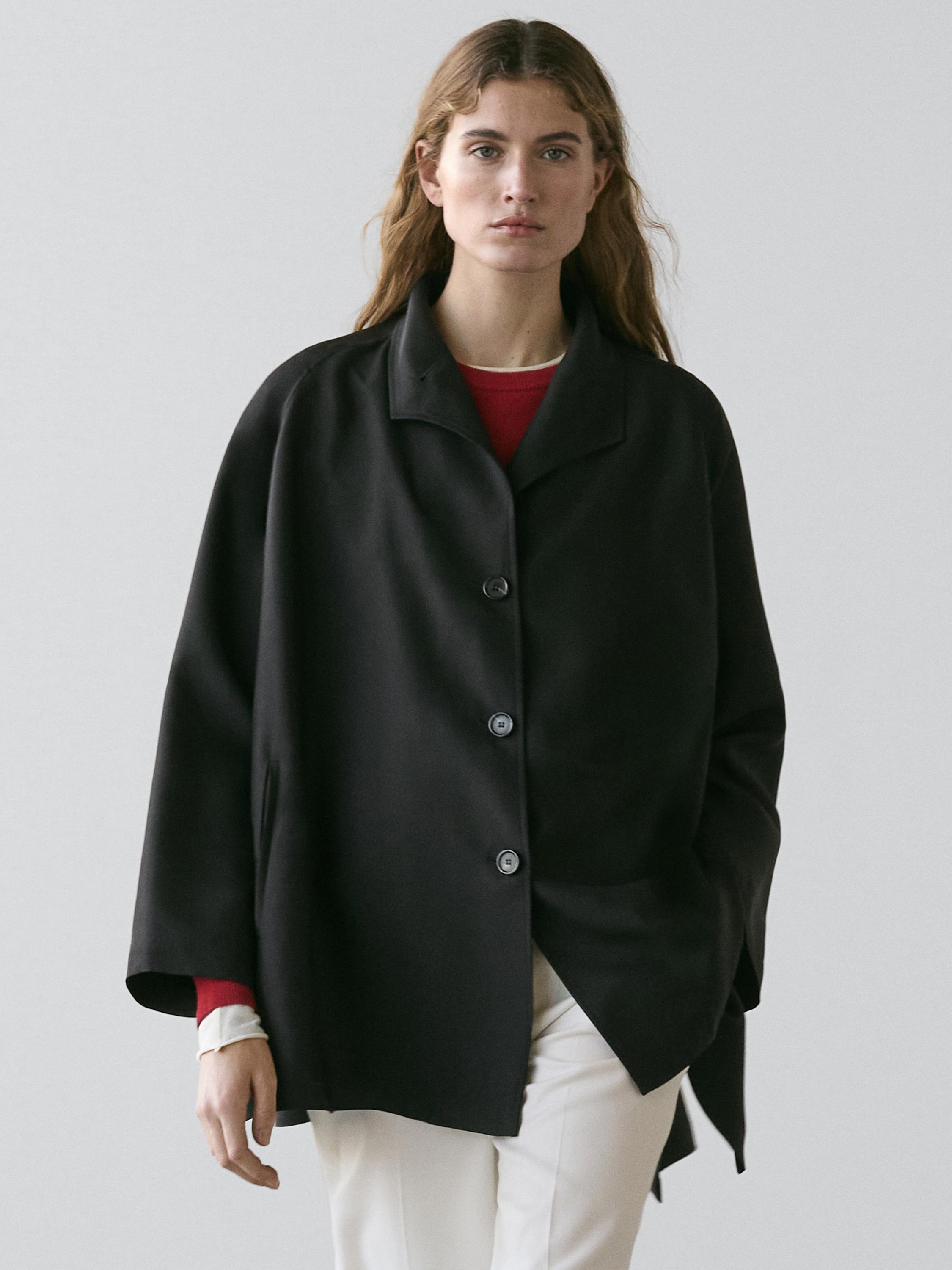 Flowing voluminous cape with button details — BLACK