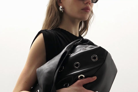 Nappa leather bag with eyelets