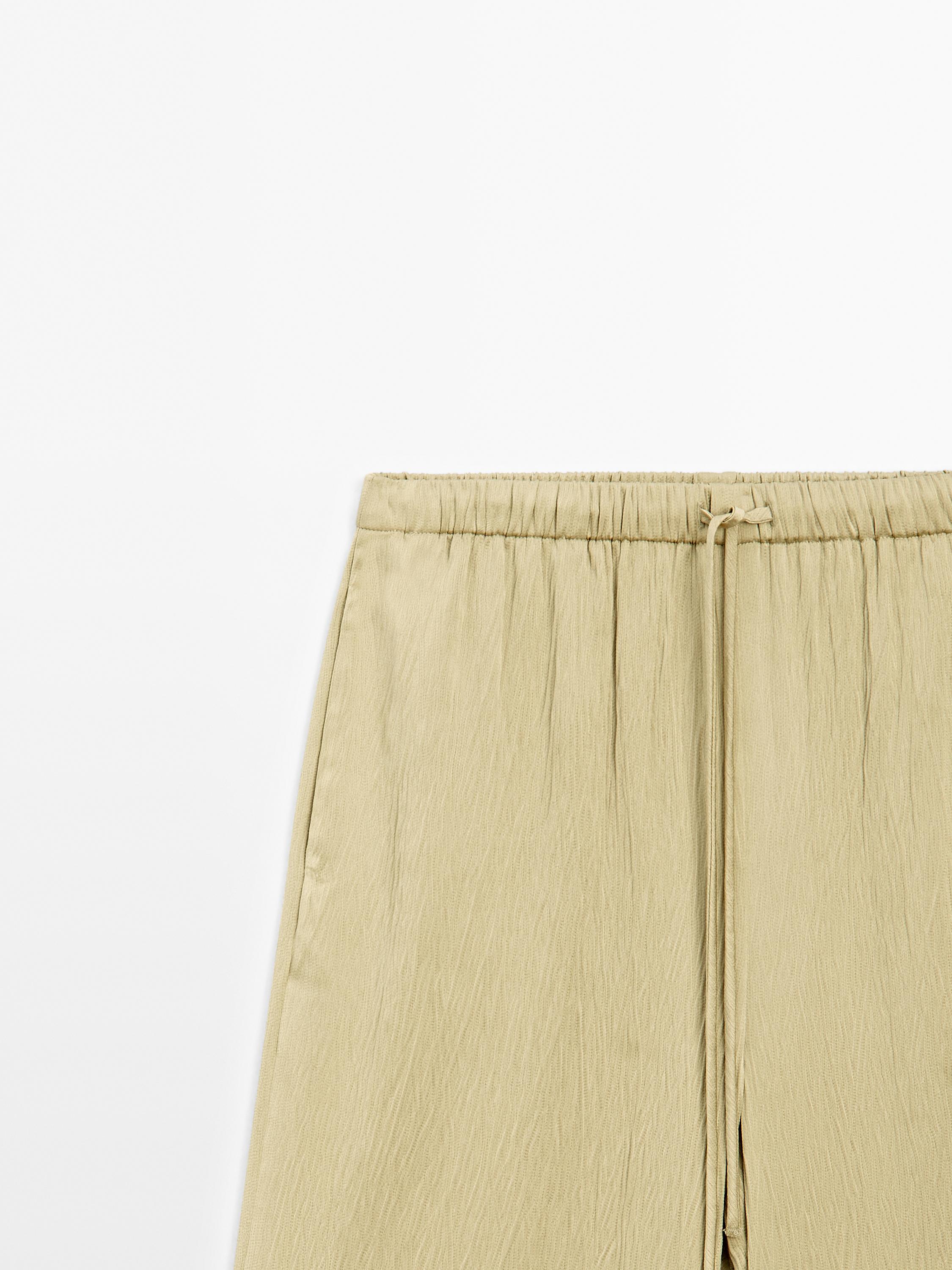 Flowing wide-leg embroidered trousers