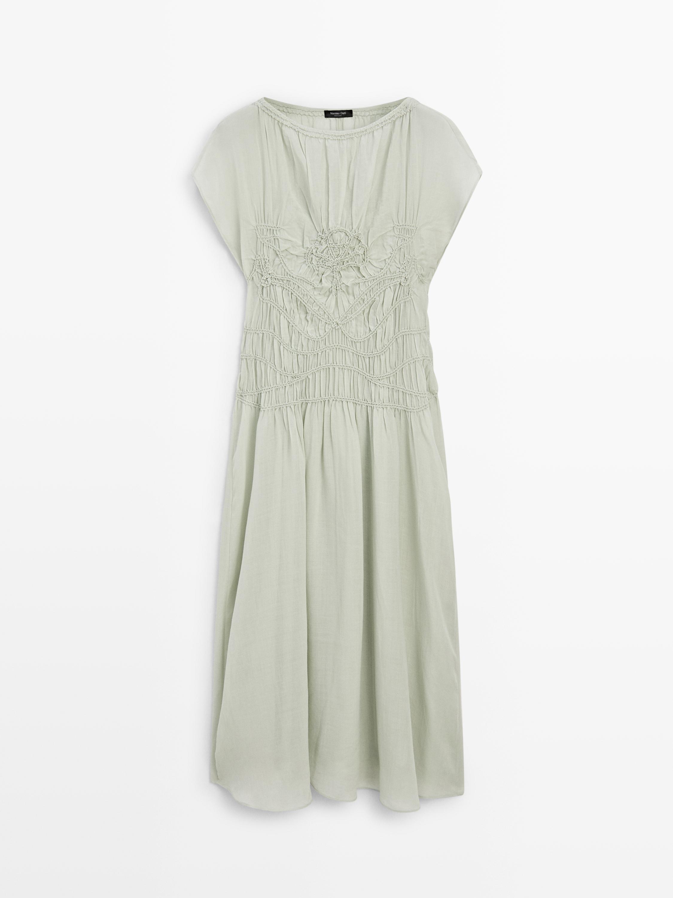 Long flowing dress with embroidered details