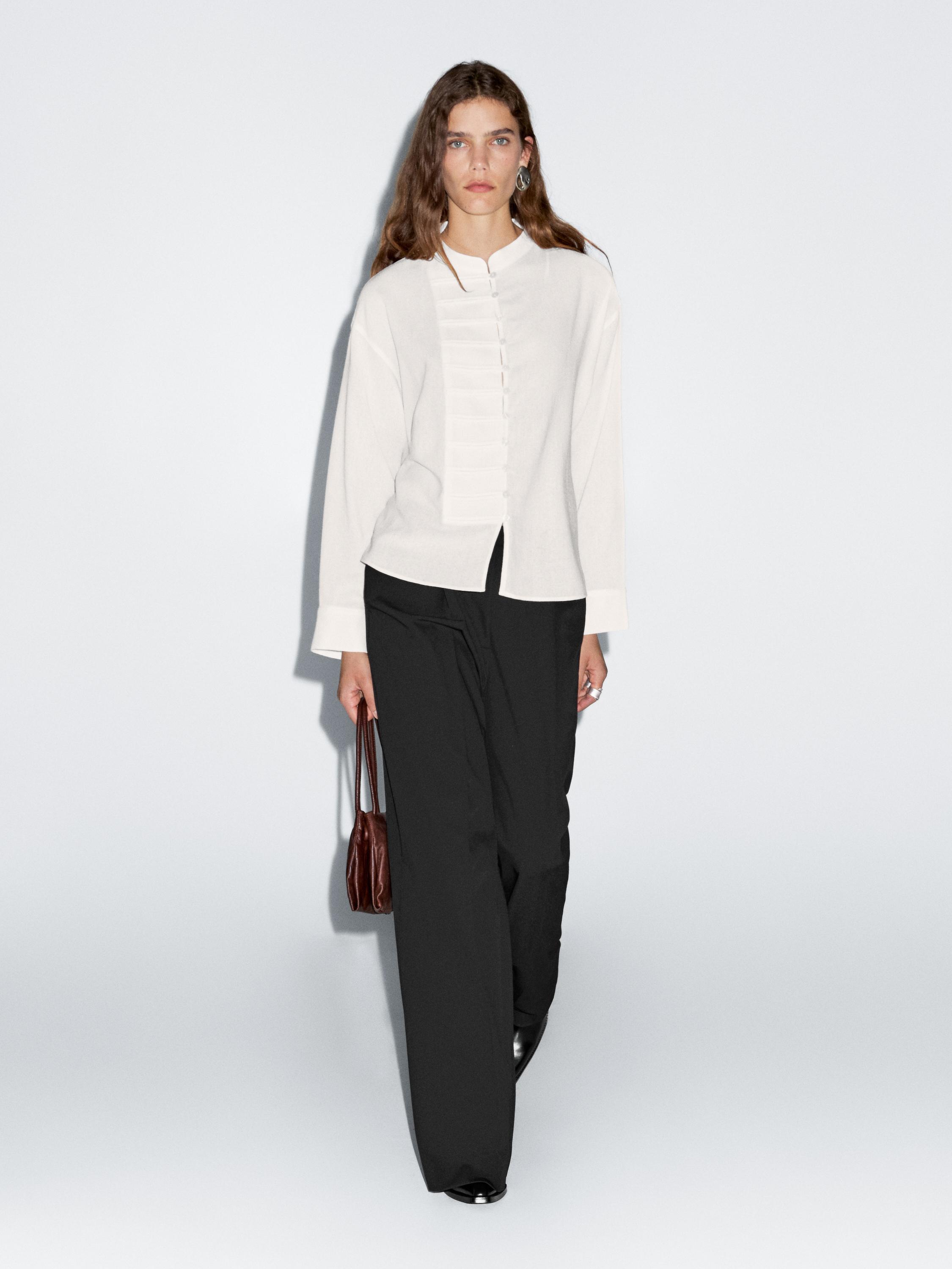 Top met ronde hals en naaddetails
