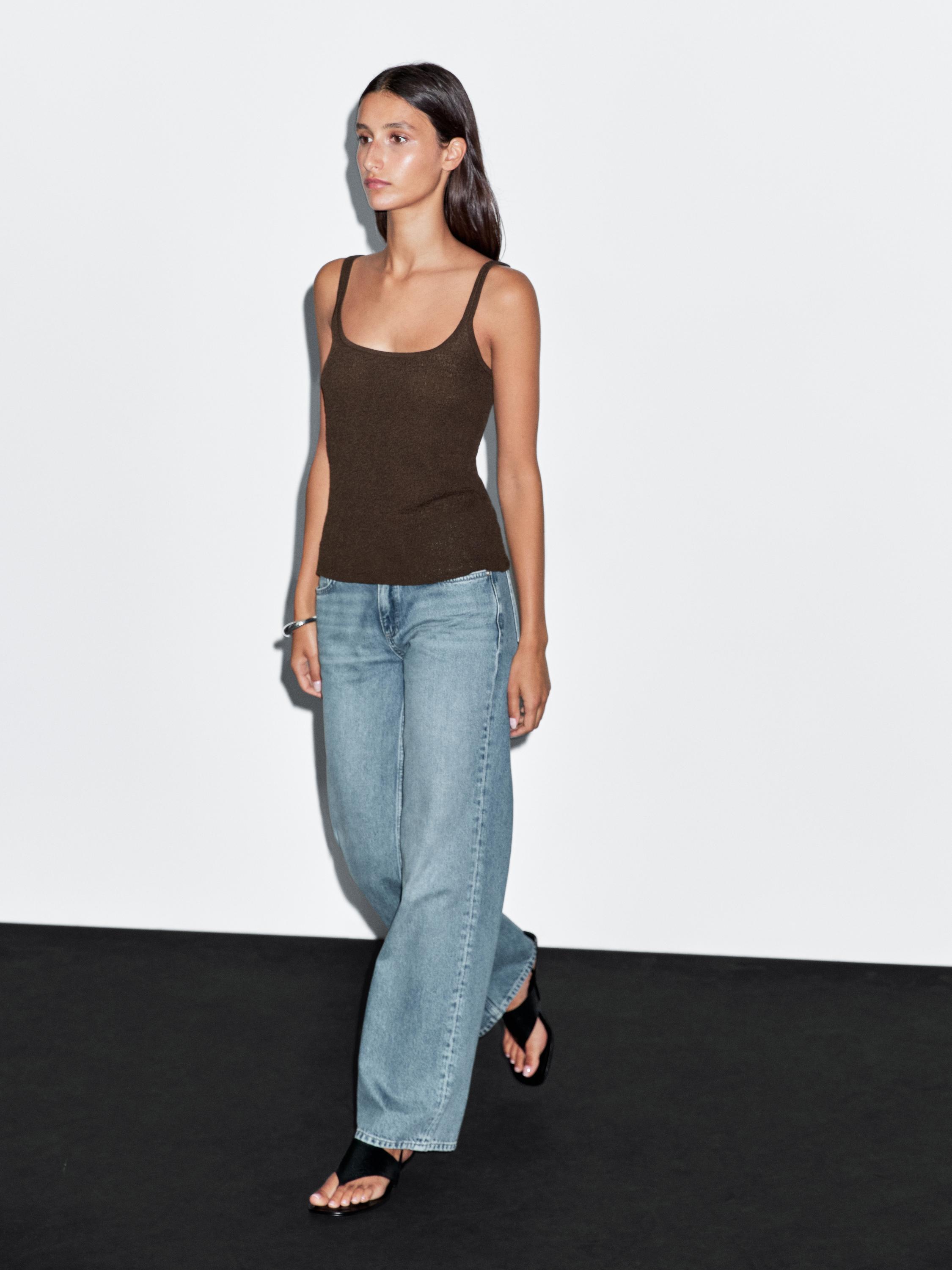 Flowing knit top with straps