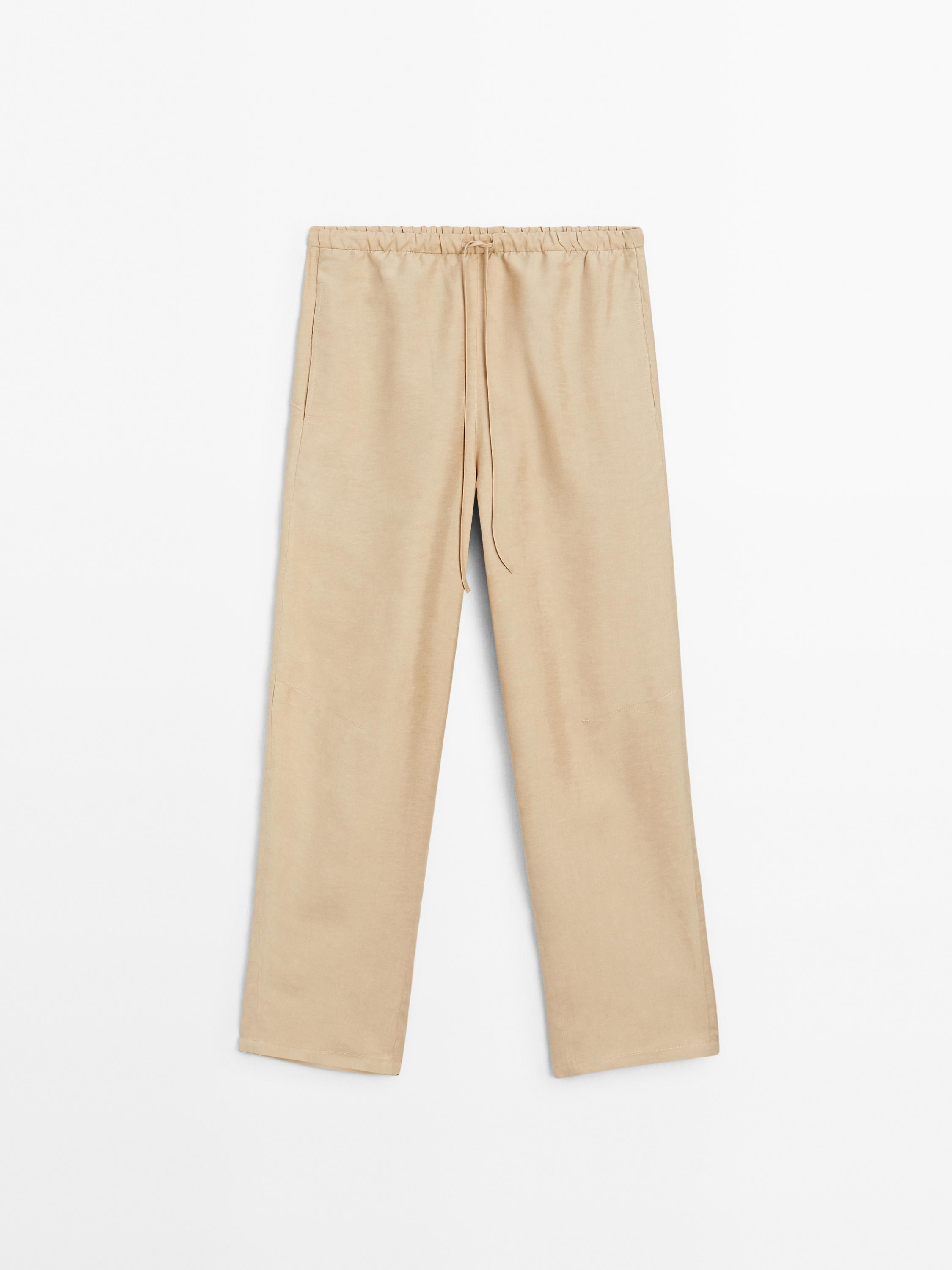 Fluid barrel trousers with linen