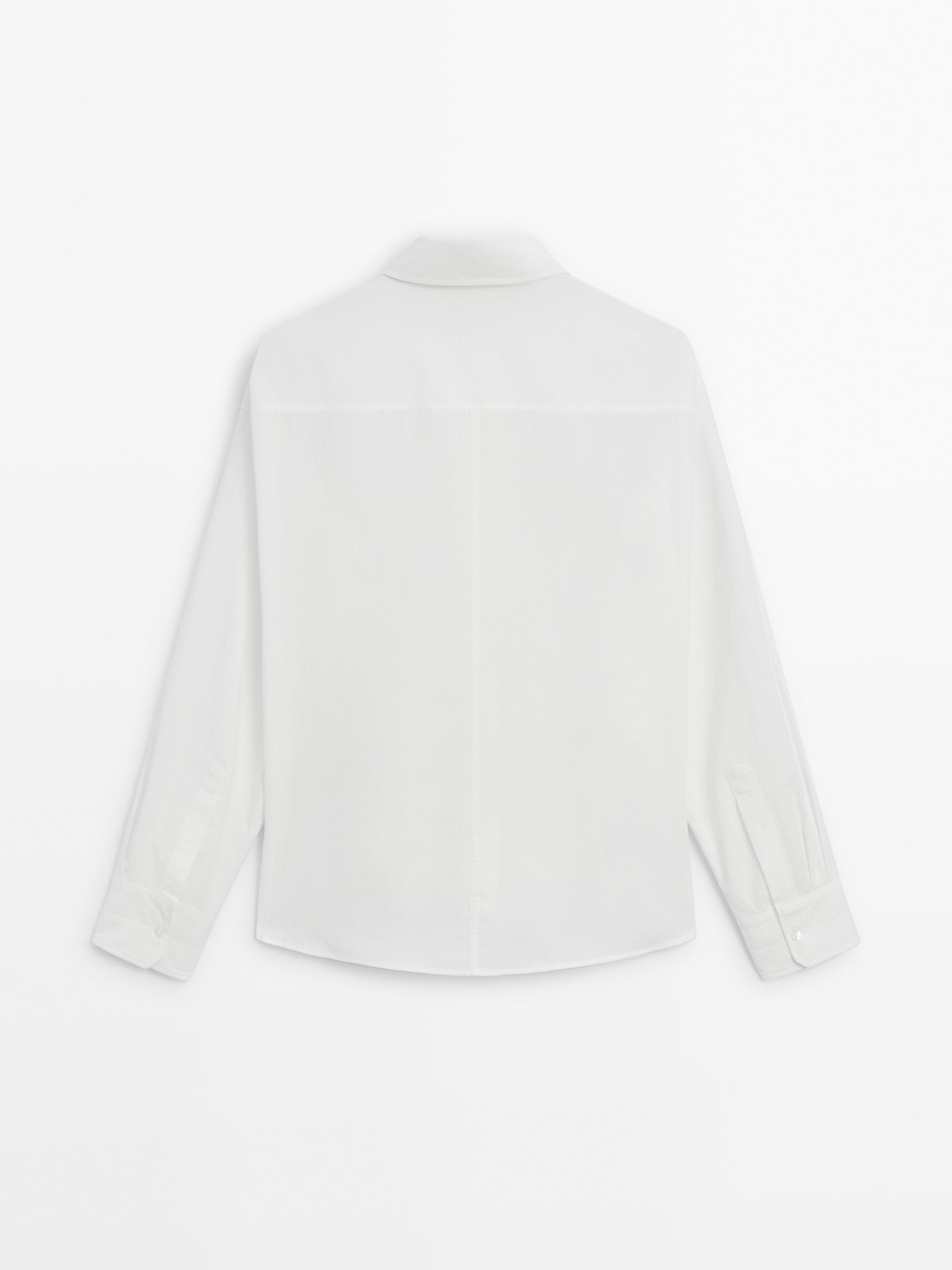 Poplin shirt with asymmetric hem