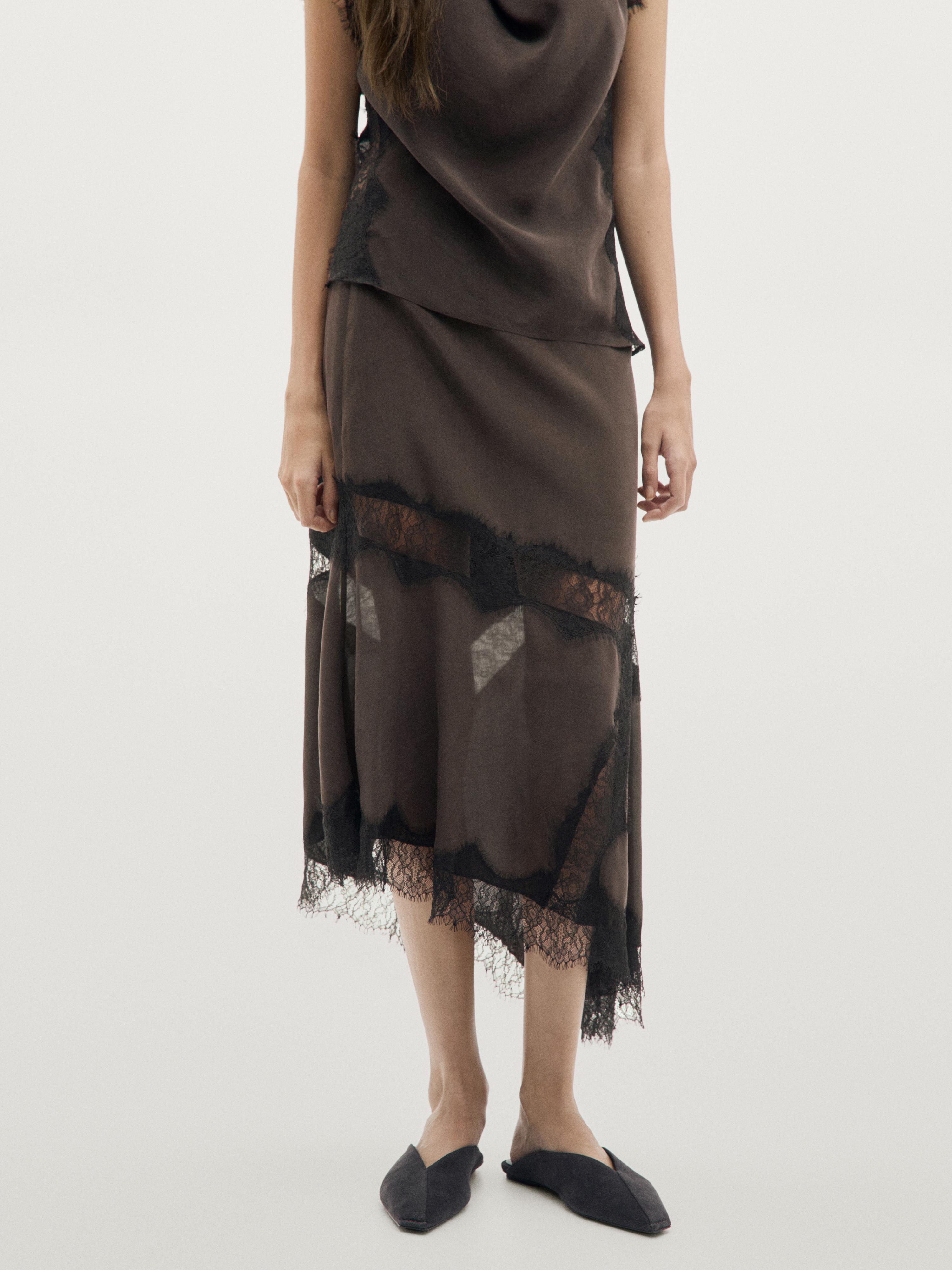 Falda midi fluida asimétrica detalle encaje