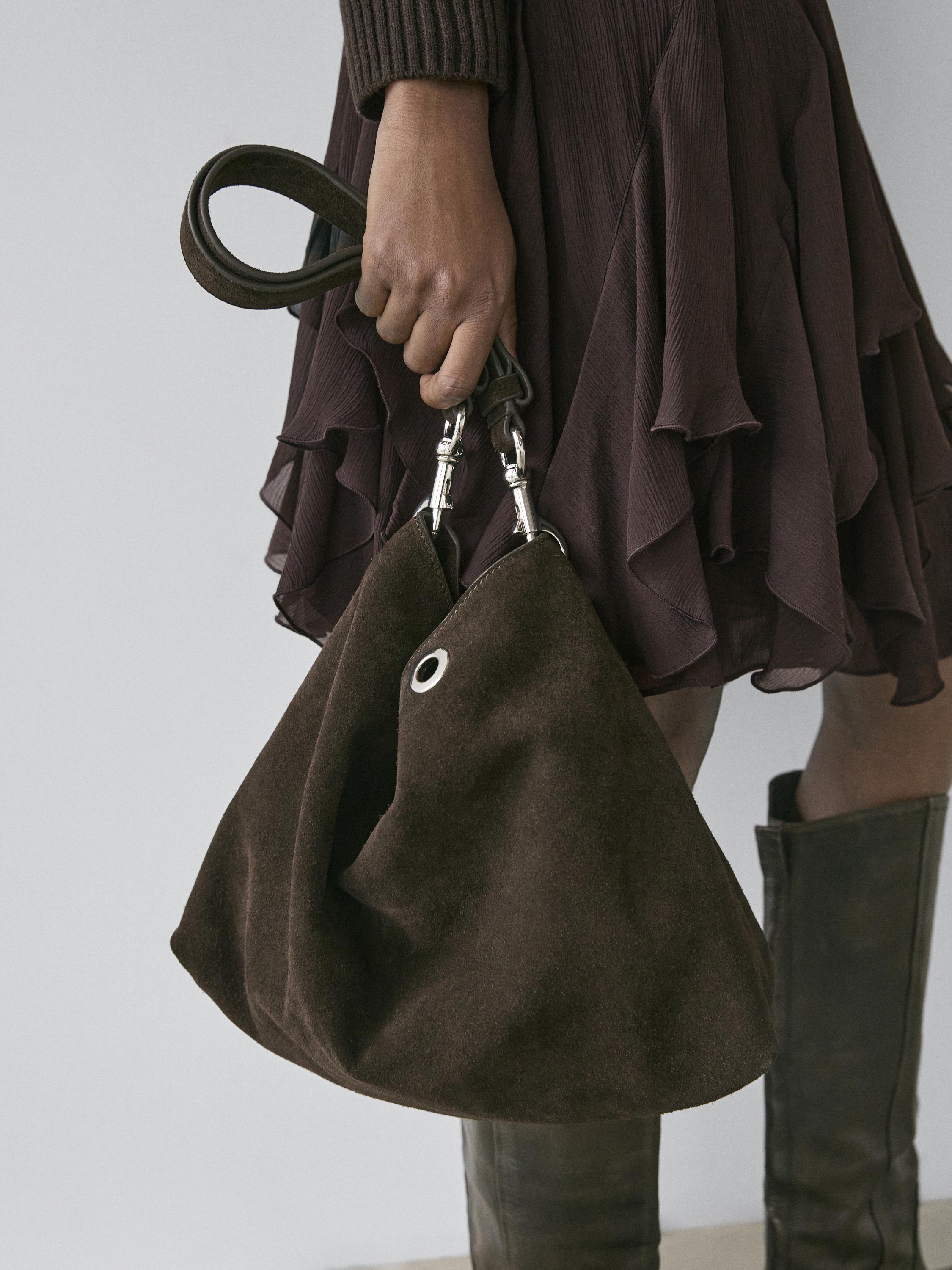 Handtasche mit Ösen aus Rauleder