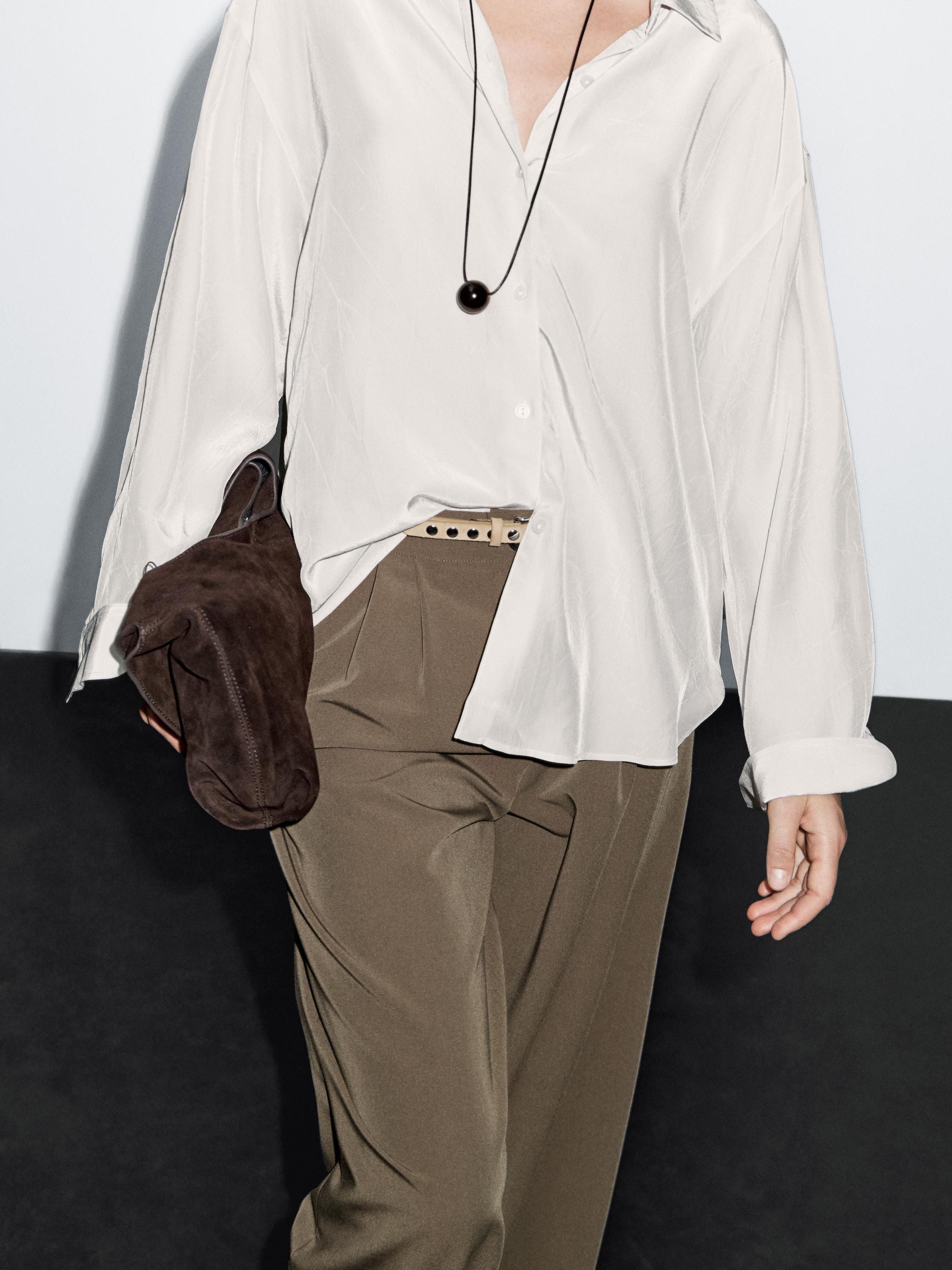 Wide-leg flowing trousers with darts