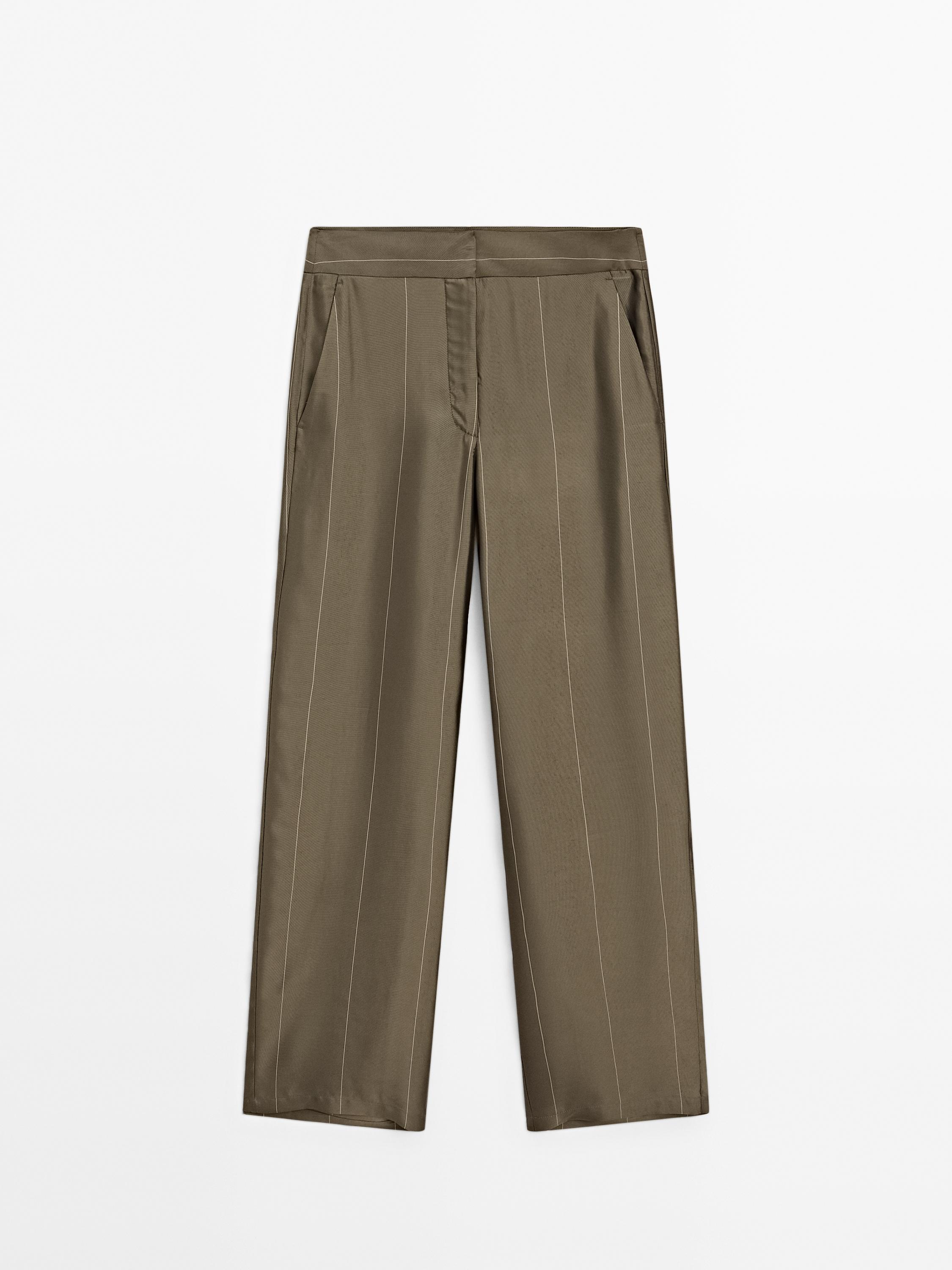 Flowing trousers with striped details