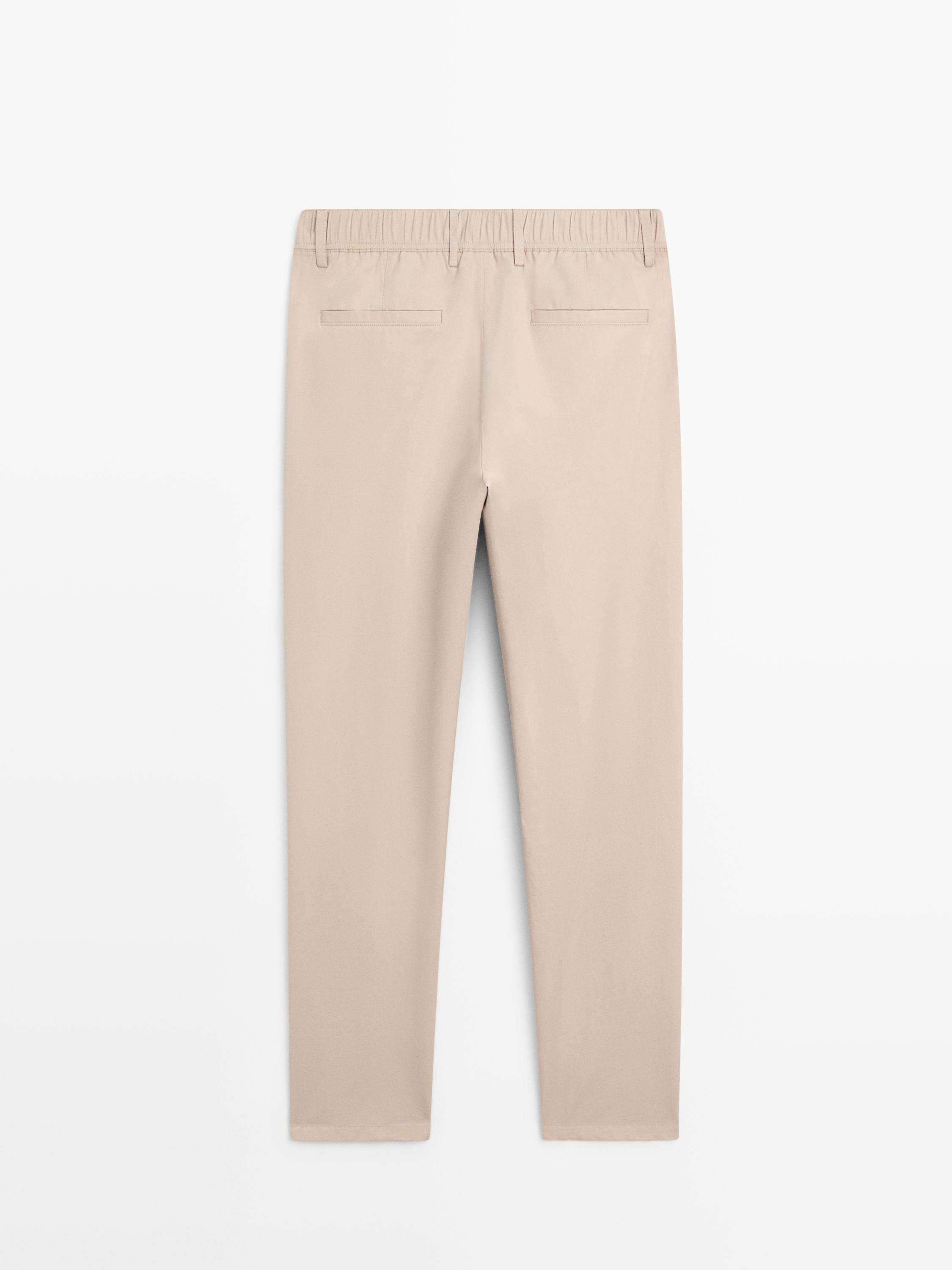 Pantallona pambuku me prerje sportive