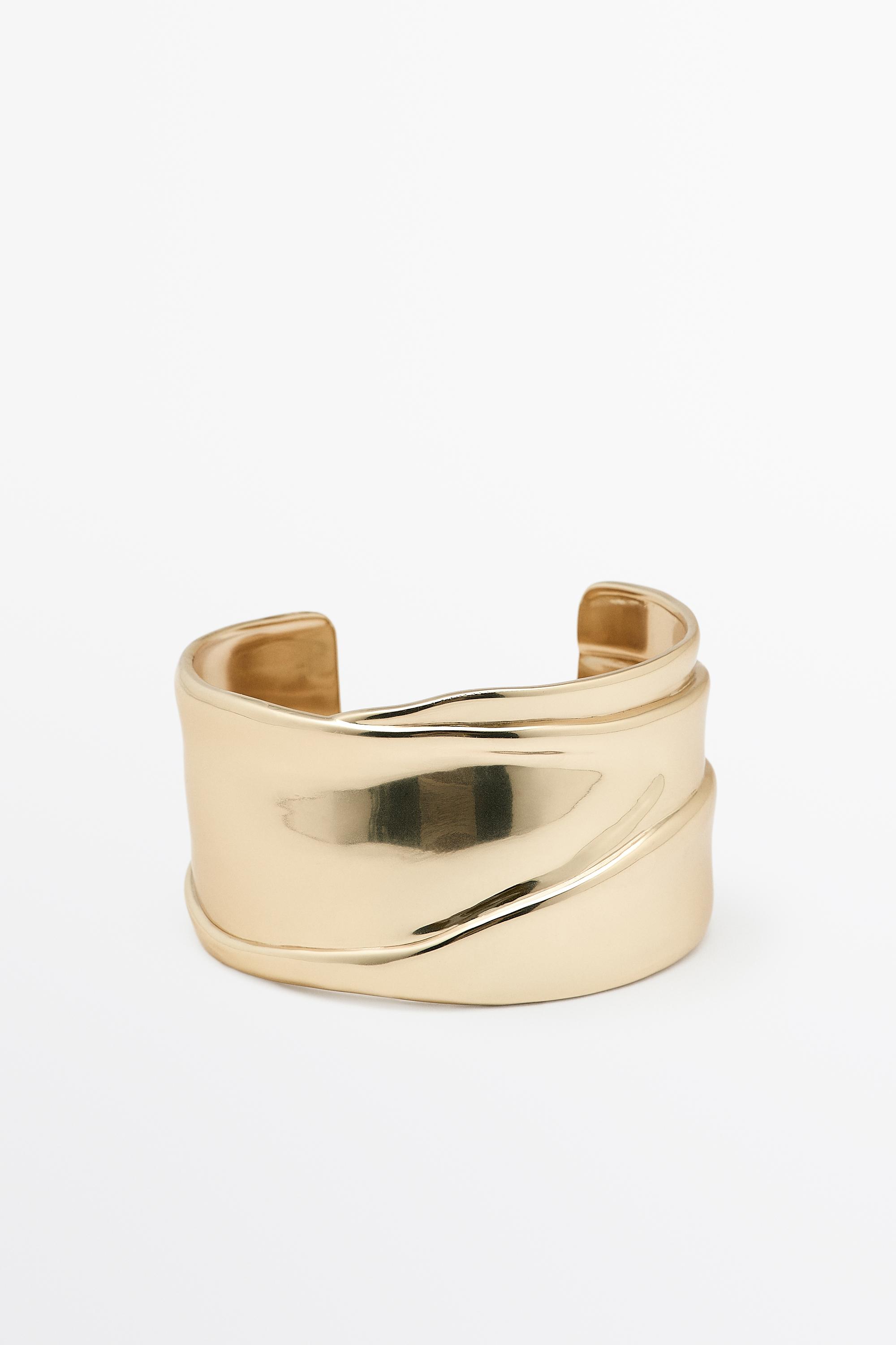Pulsera ancha drapeada