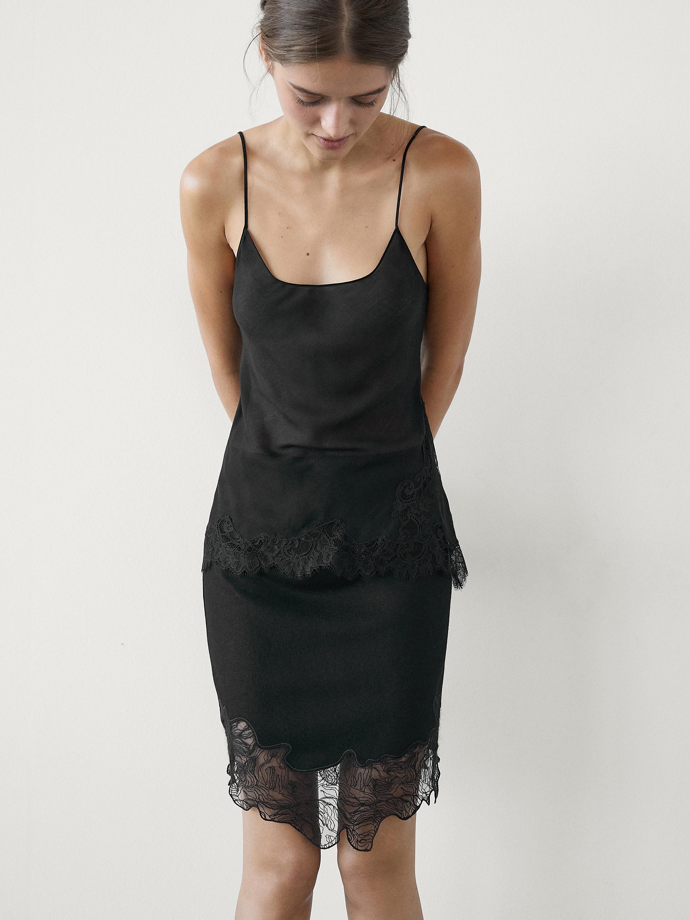 Short asymmetric lace-trimmed skirt