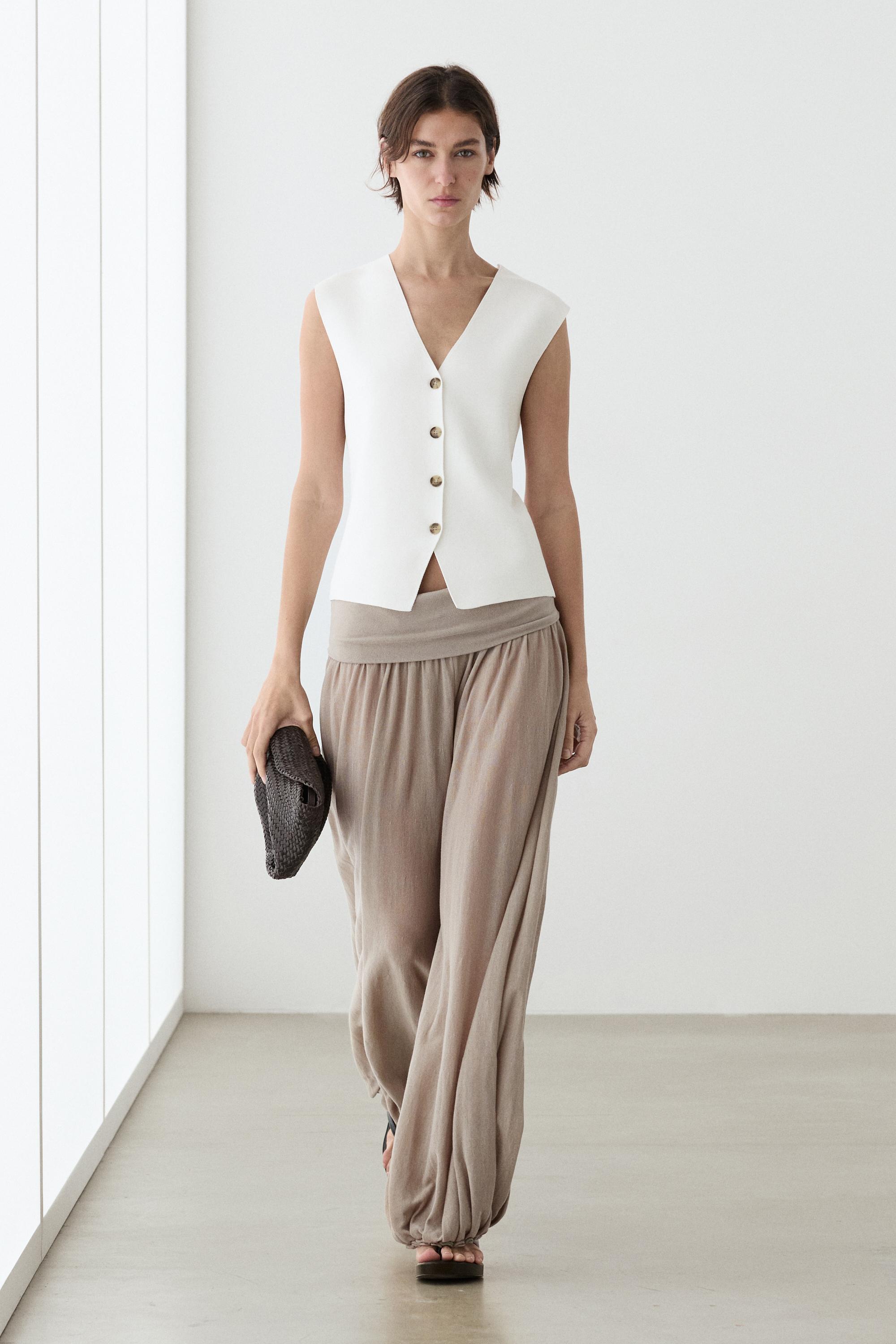 Knit waistcoat with button details — WHITE