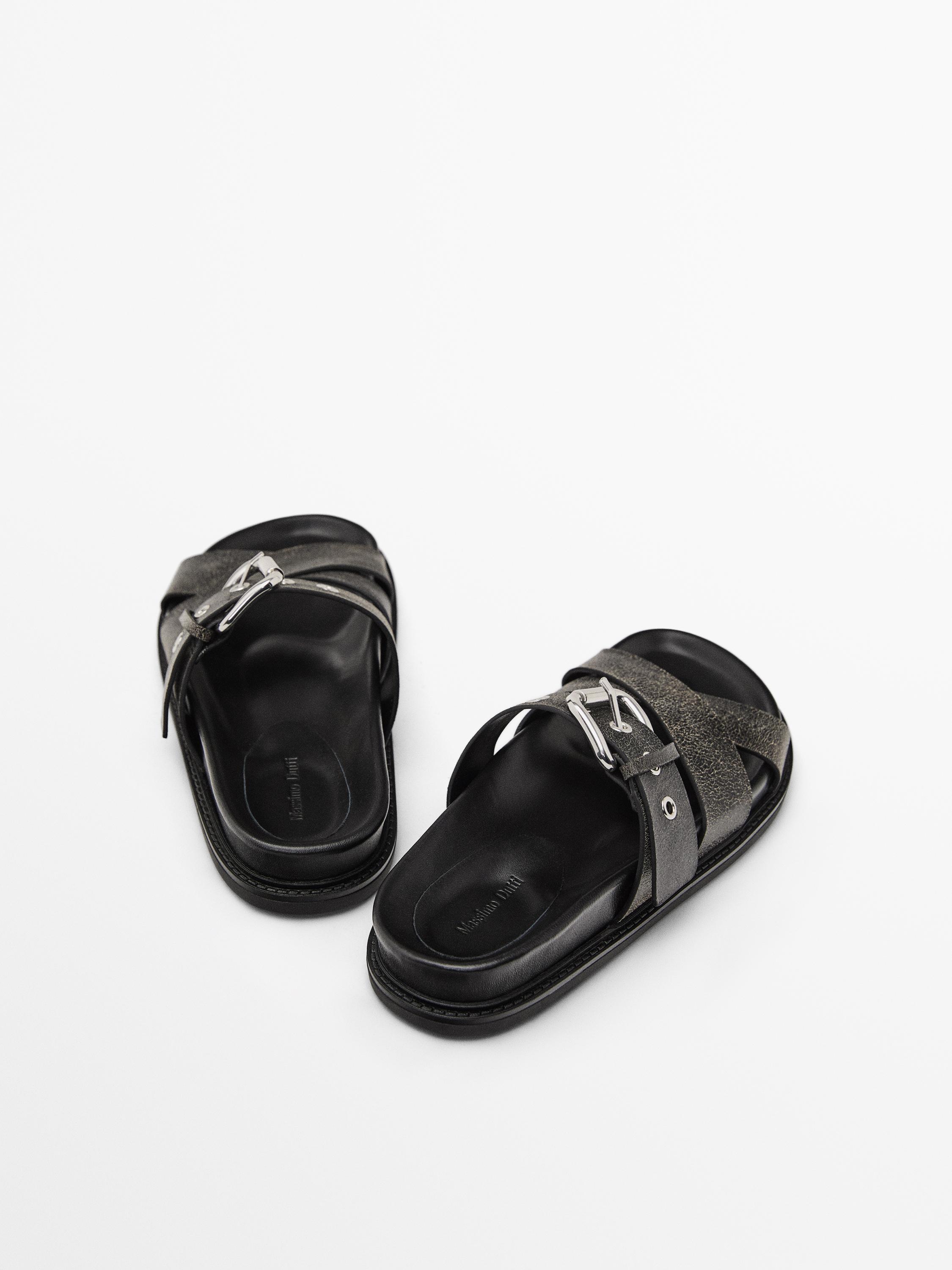Crackled leather criss-cross sandals