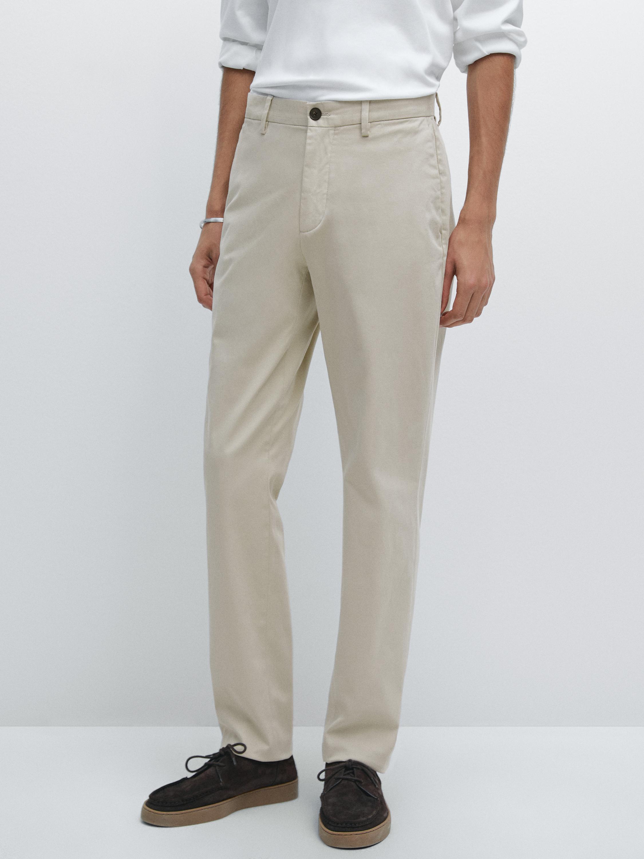 Calças slim fit 100% algodão