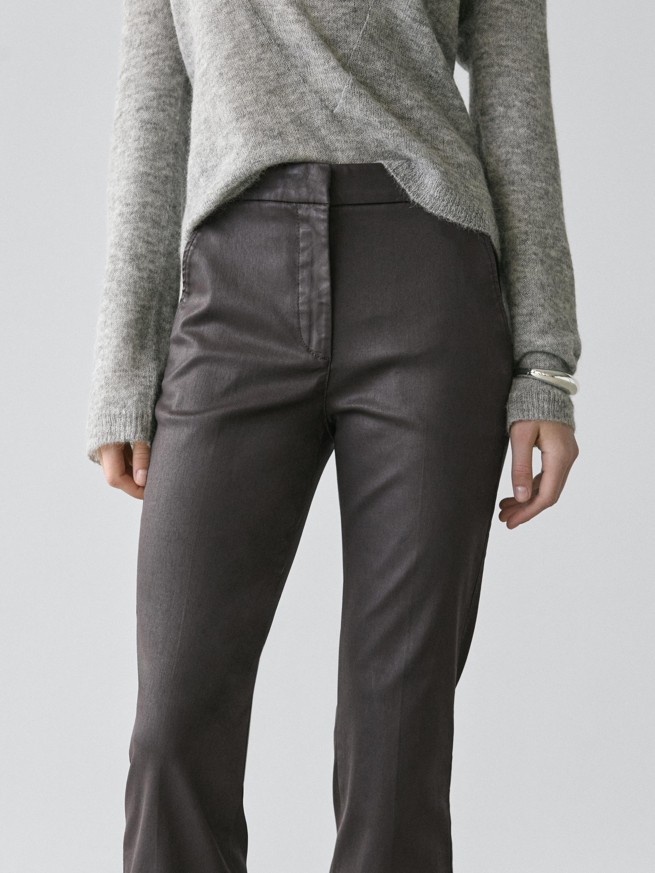 Coated flared trousers