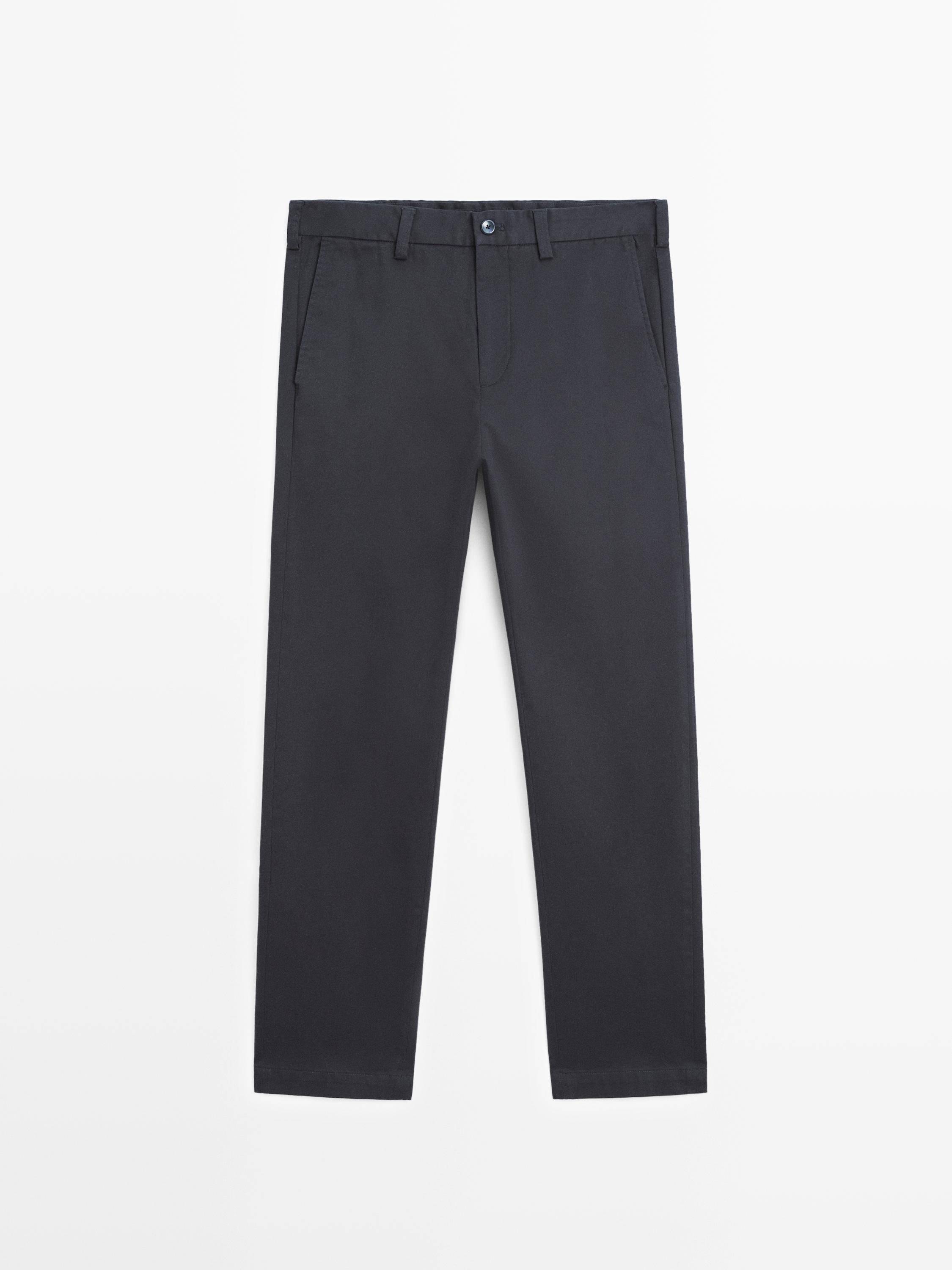 Tapered fit micro textured trousers — NAVY BLUE