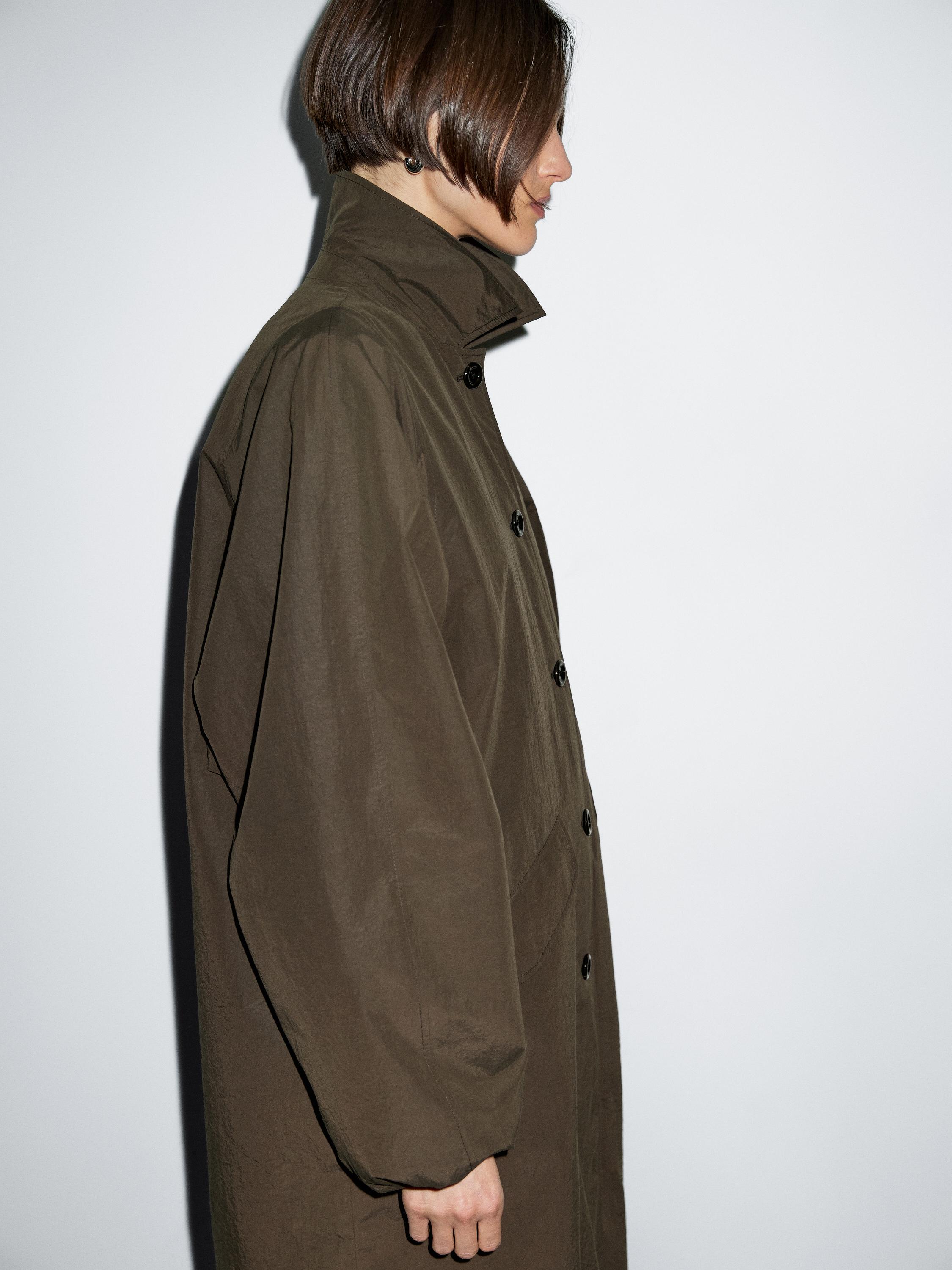 Technical fabric trench coat with button detail