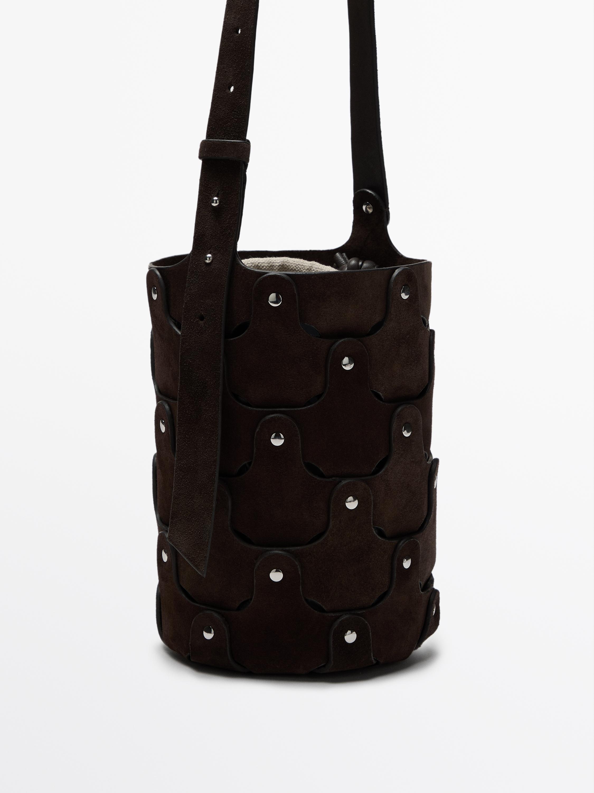 Studded split suede bucket bag