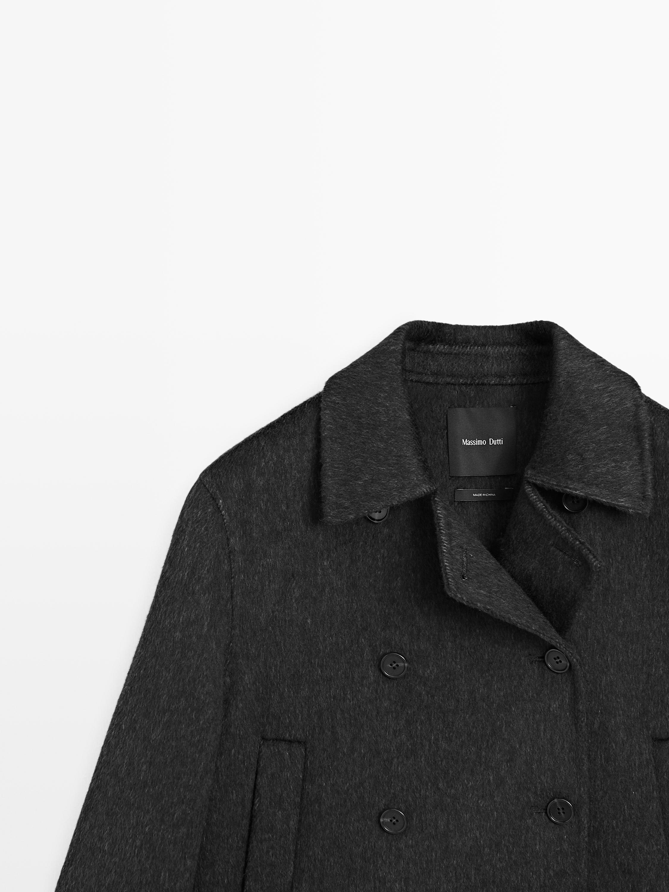 Manteau court en fausse fourrure