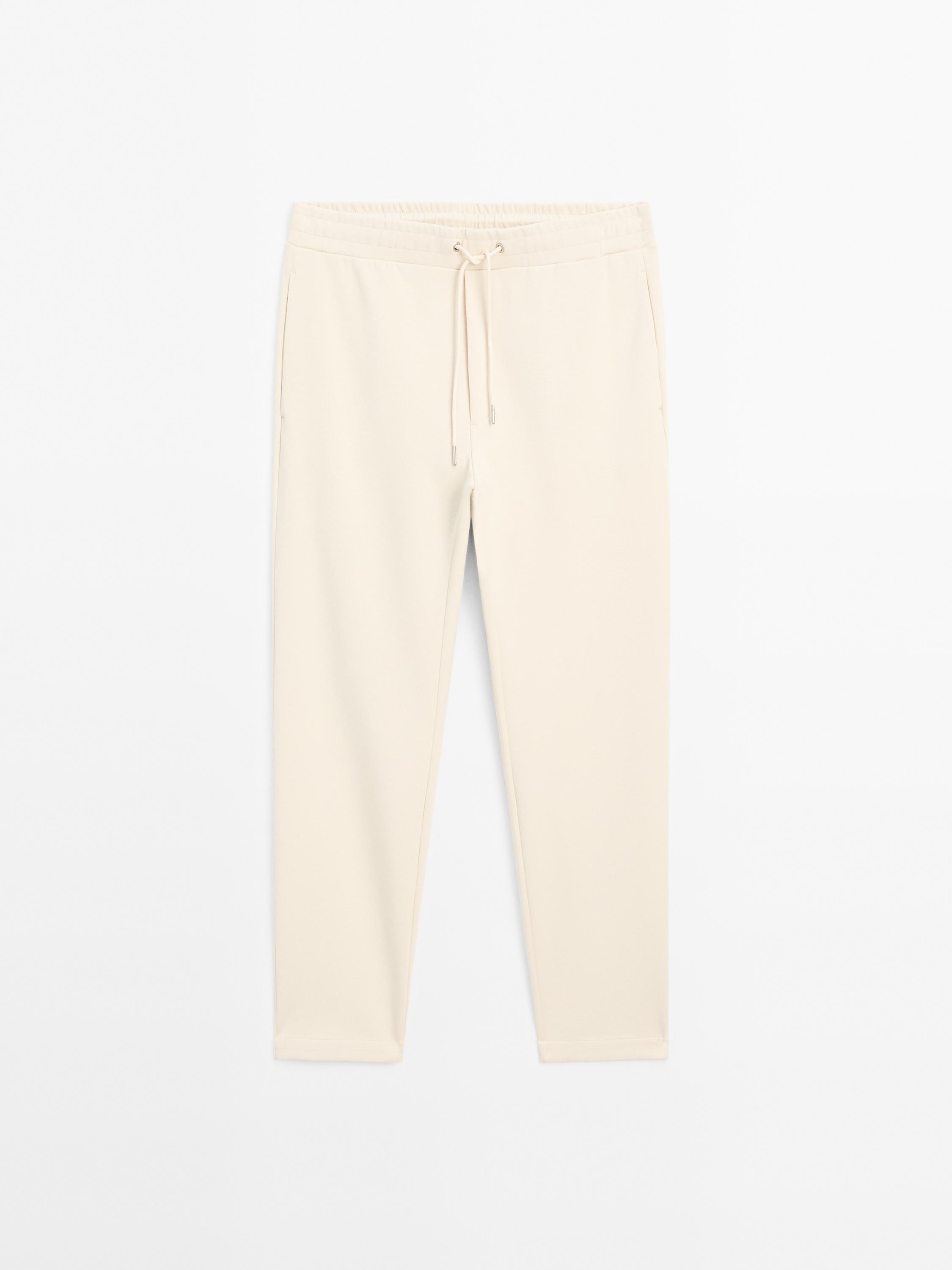 Trousers with side pocket detail