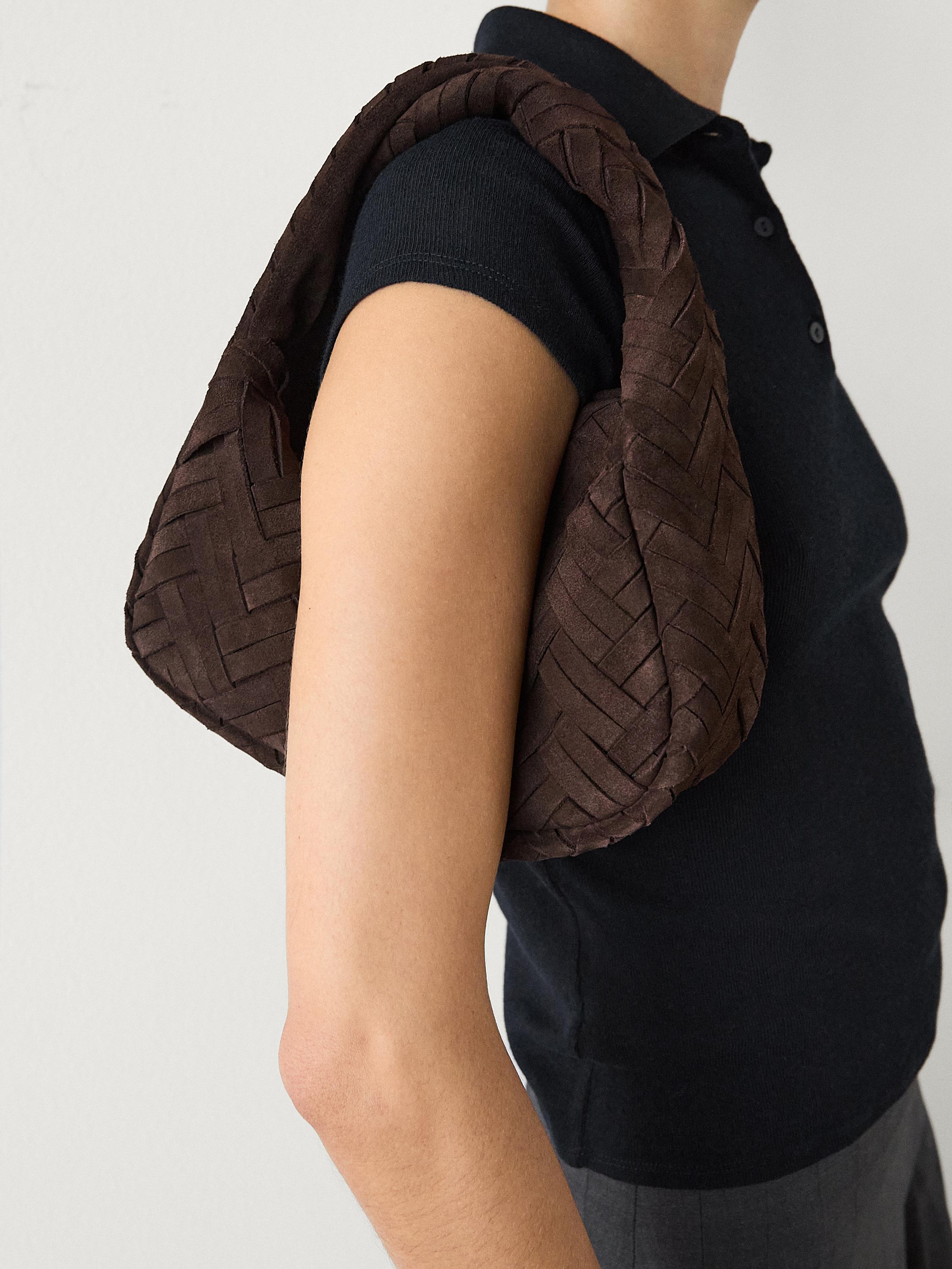 Split suede braided handbag