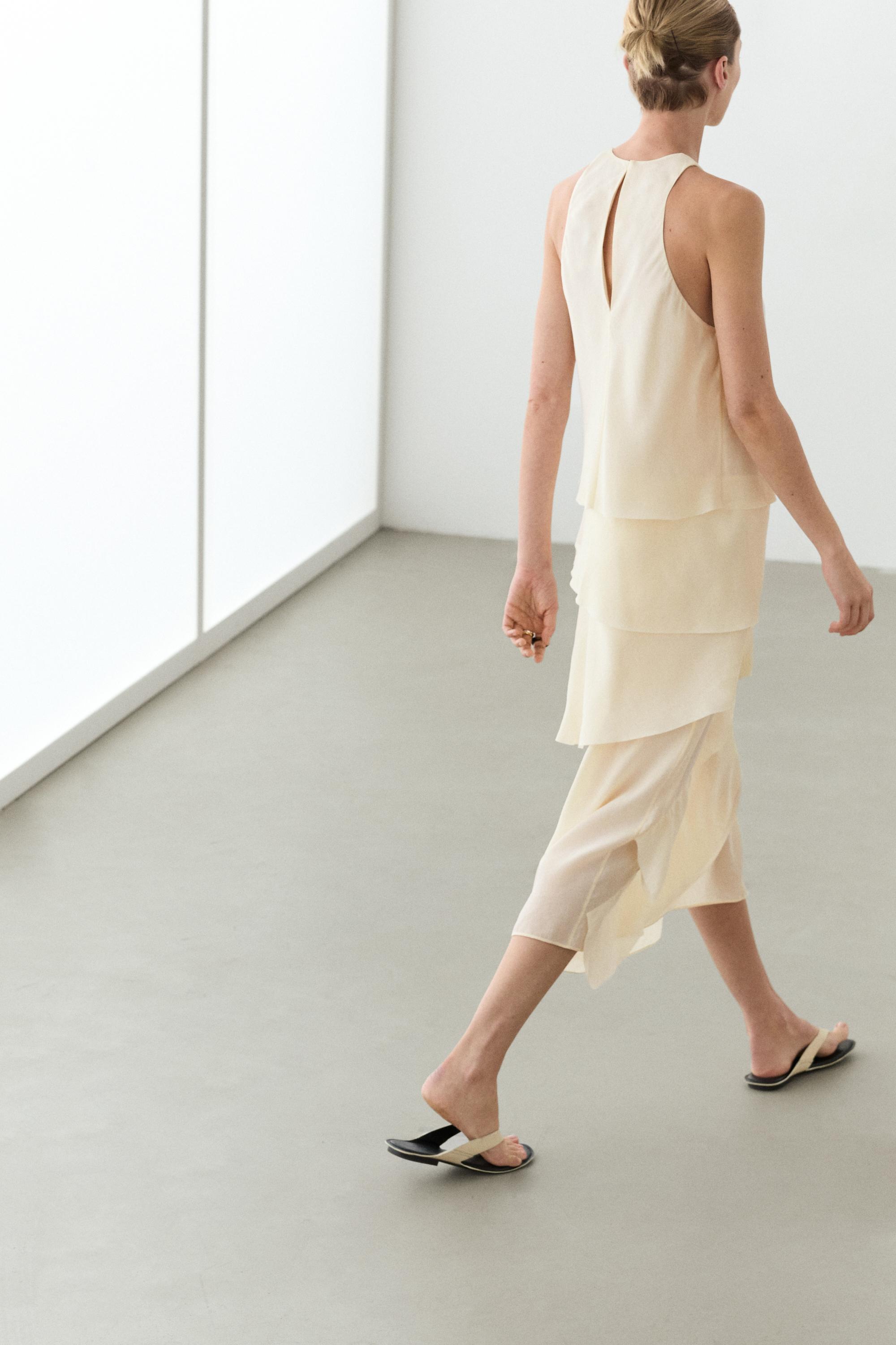 Flowing midi dress with ruffles — CREAM