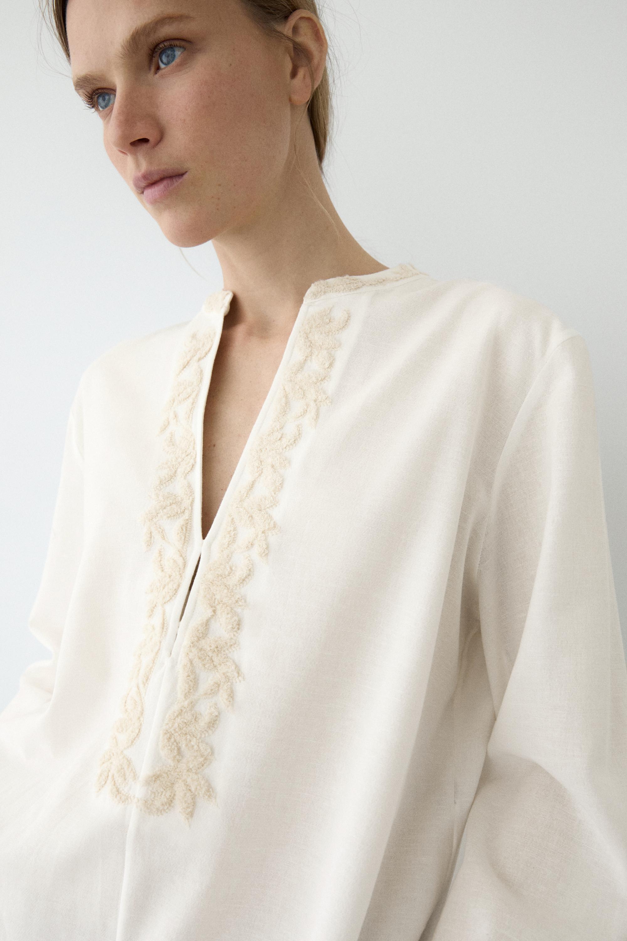 Flowing oversize blouse with stand collar and embroidery — CREAM