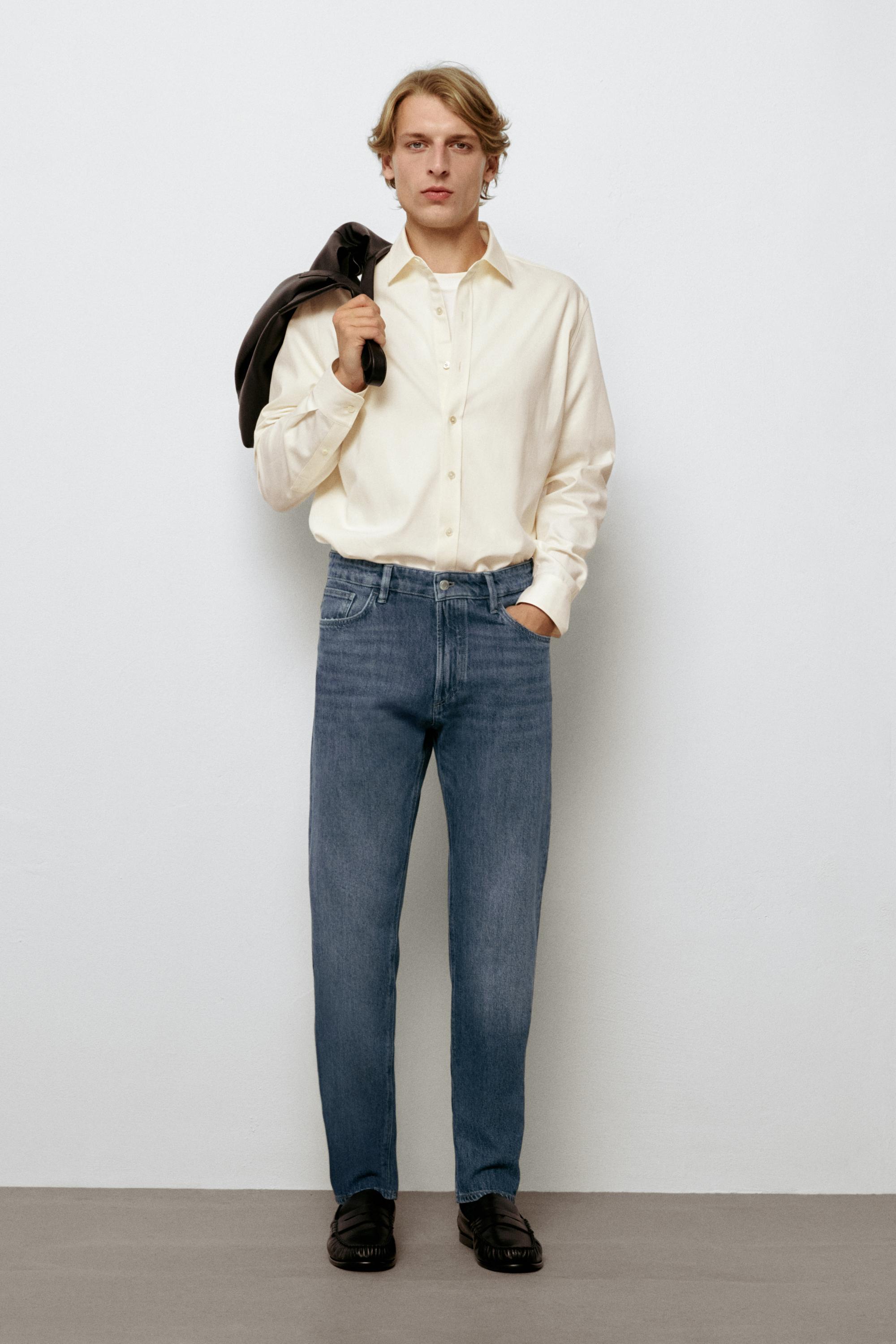 Enzymatic tapered fit jeans