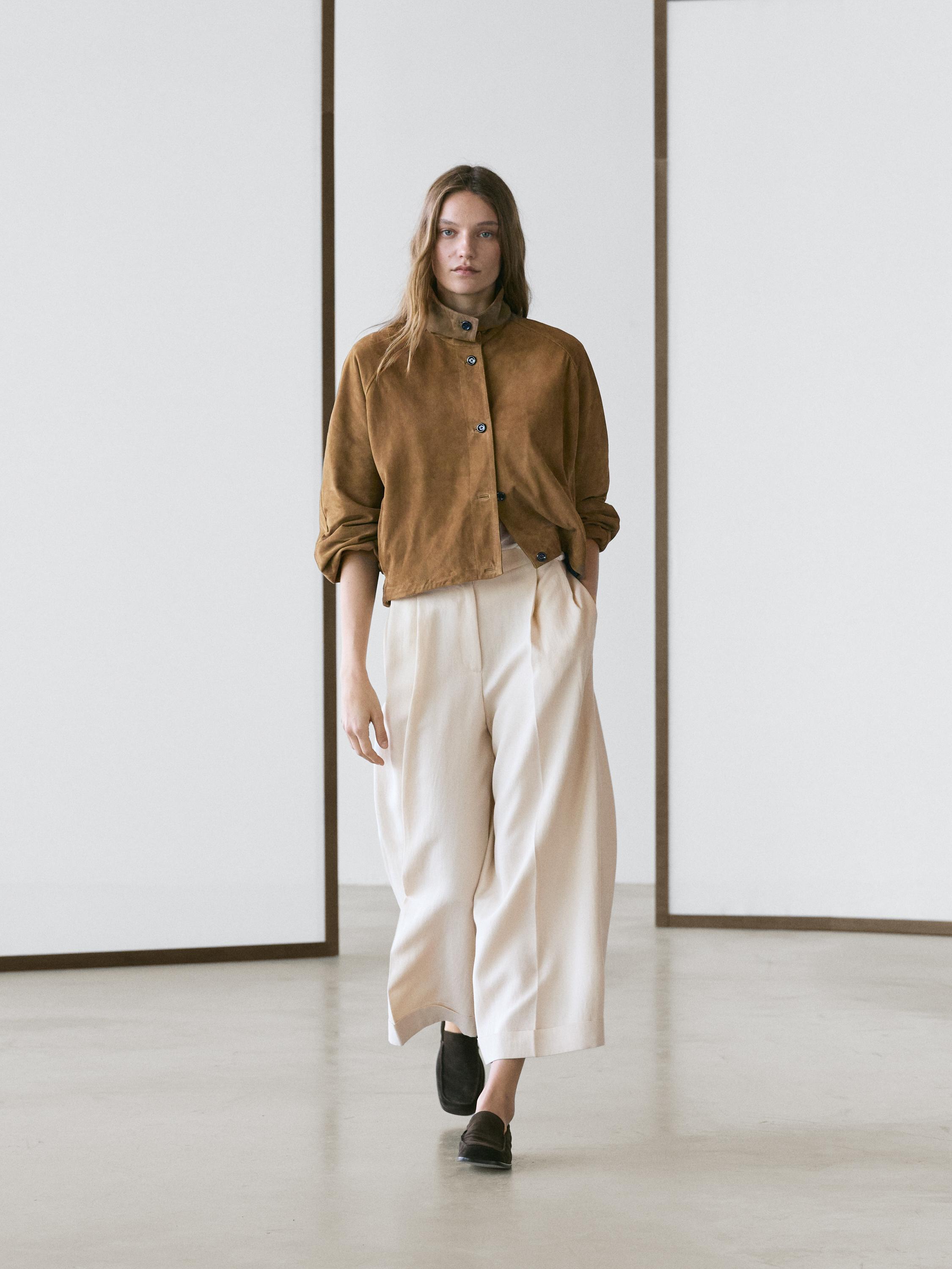 Flowing trousers with turn-up hems — CREAM