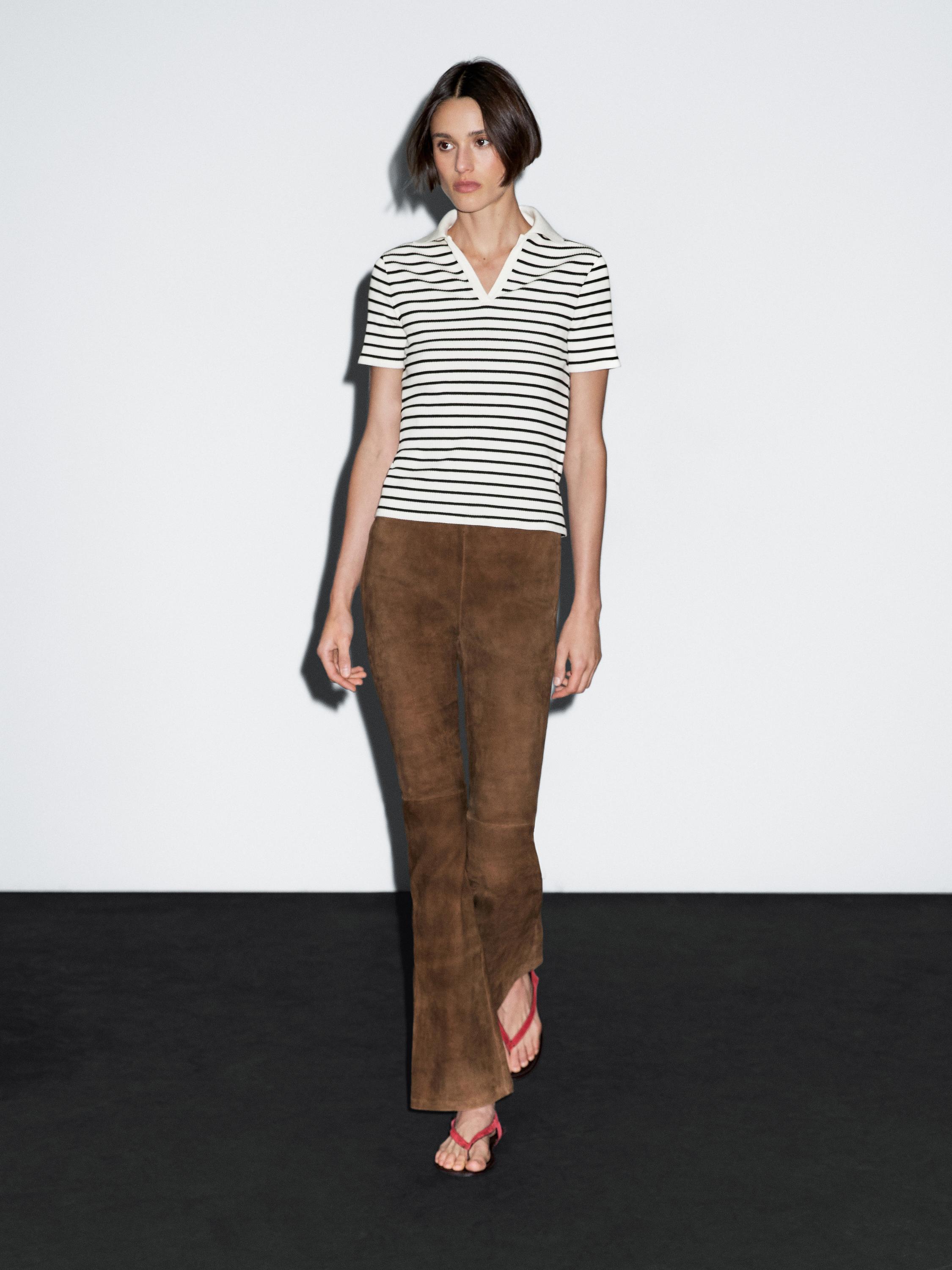 T-shirt polo às riscas em mistura de algodão