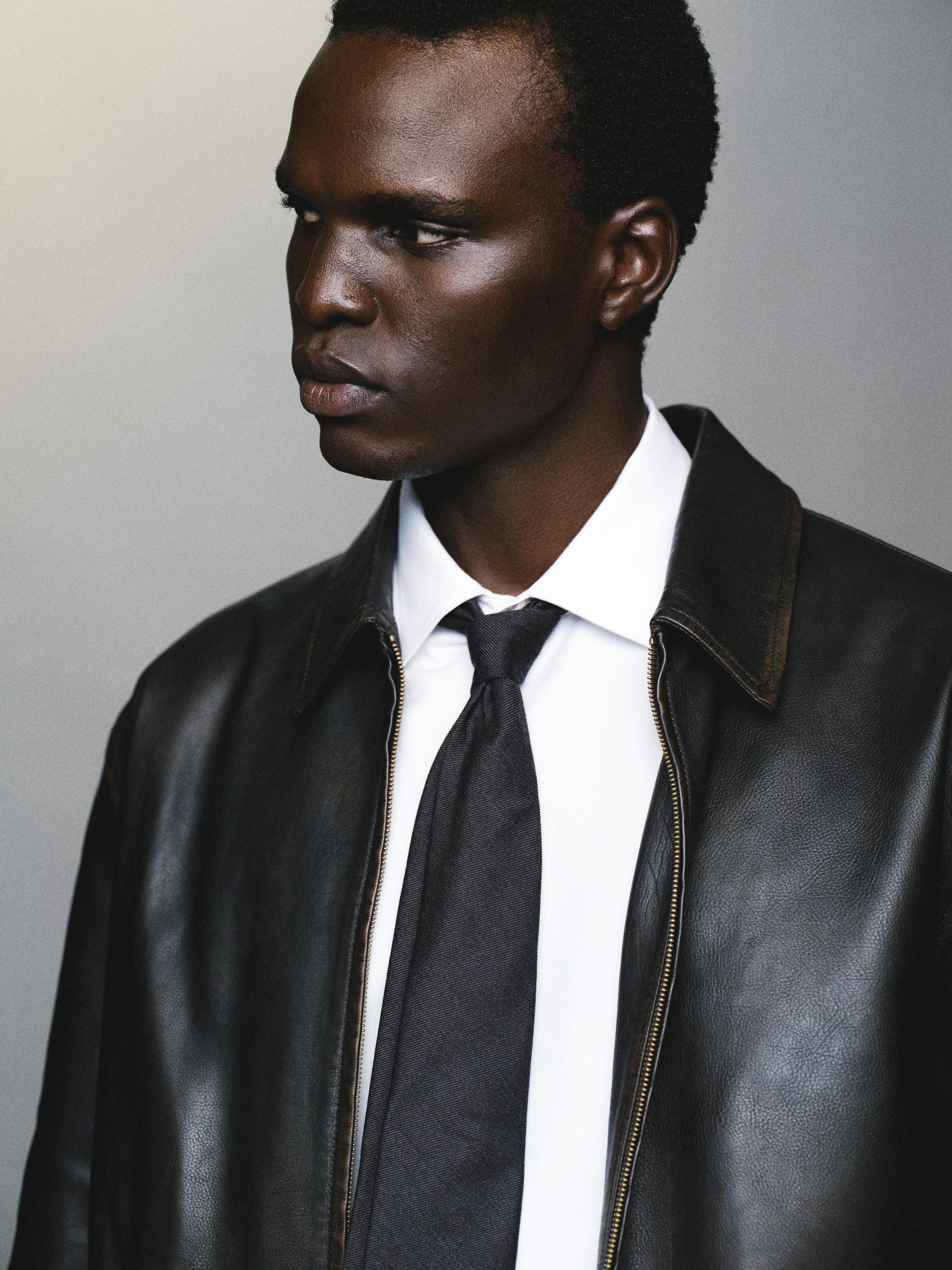 Distressed effect short nappa leather jacket
