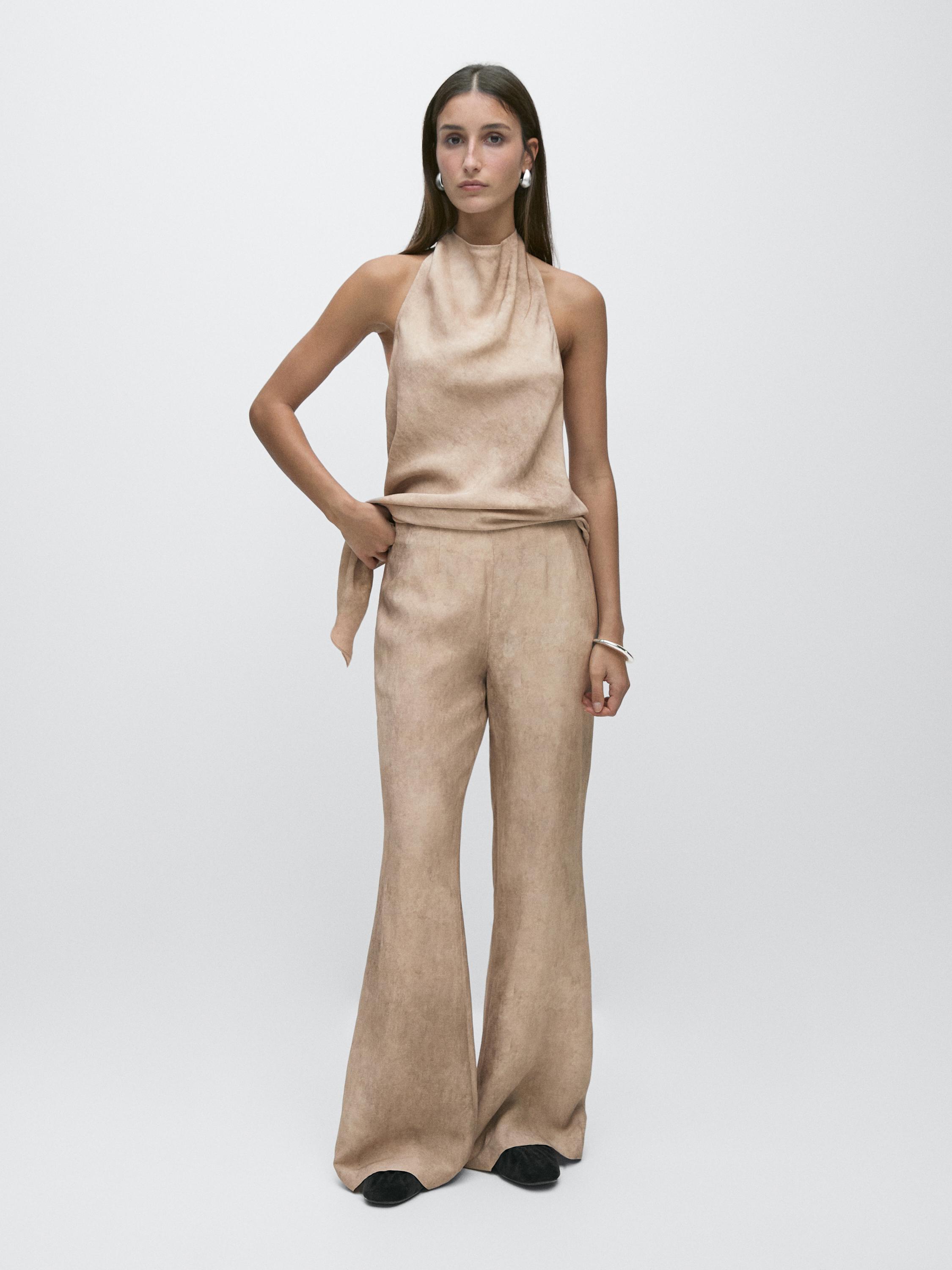 Pantalón fluido efecto desgastado