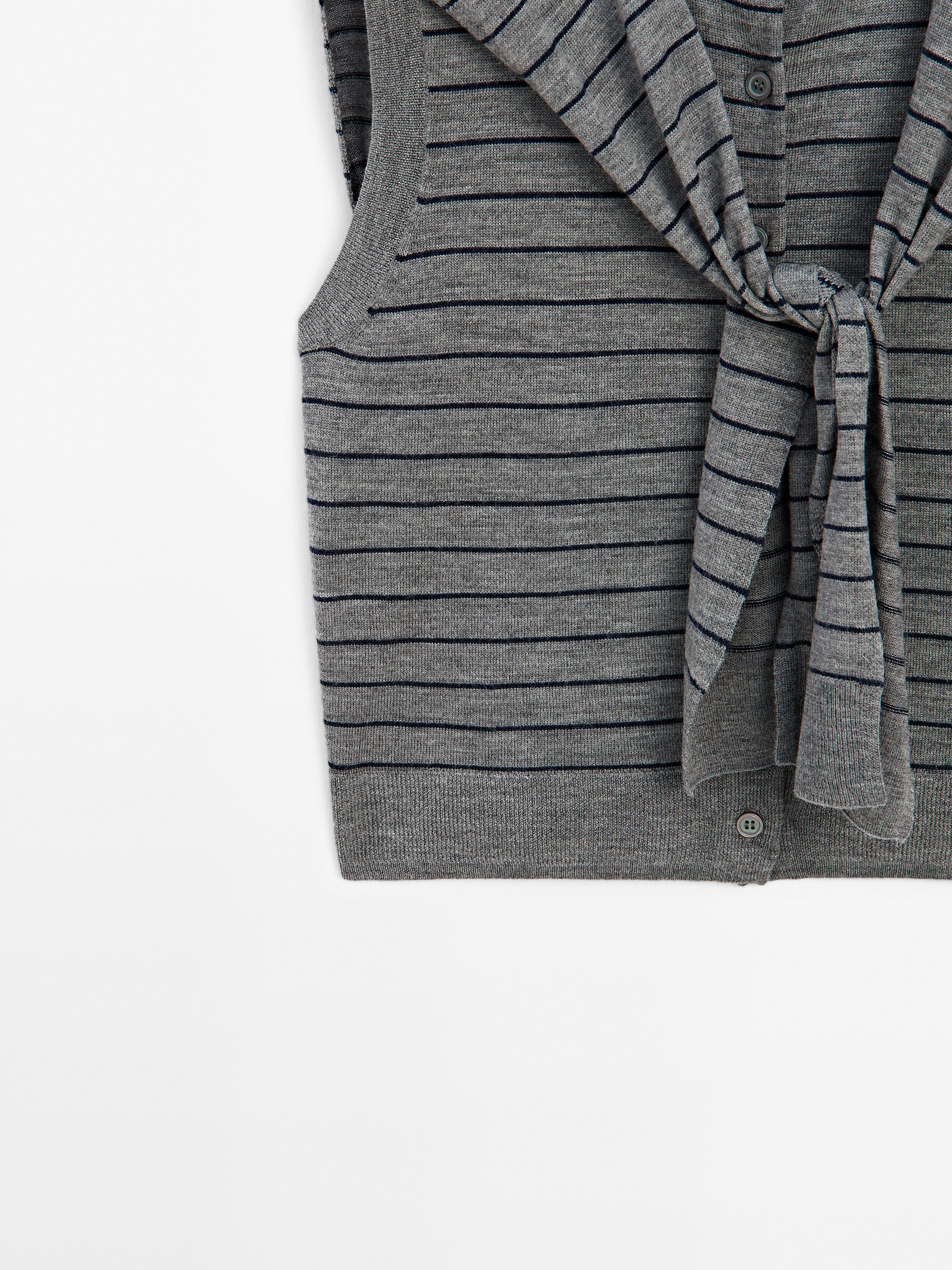 100% wool vest with sweater
