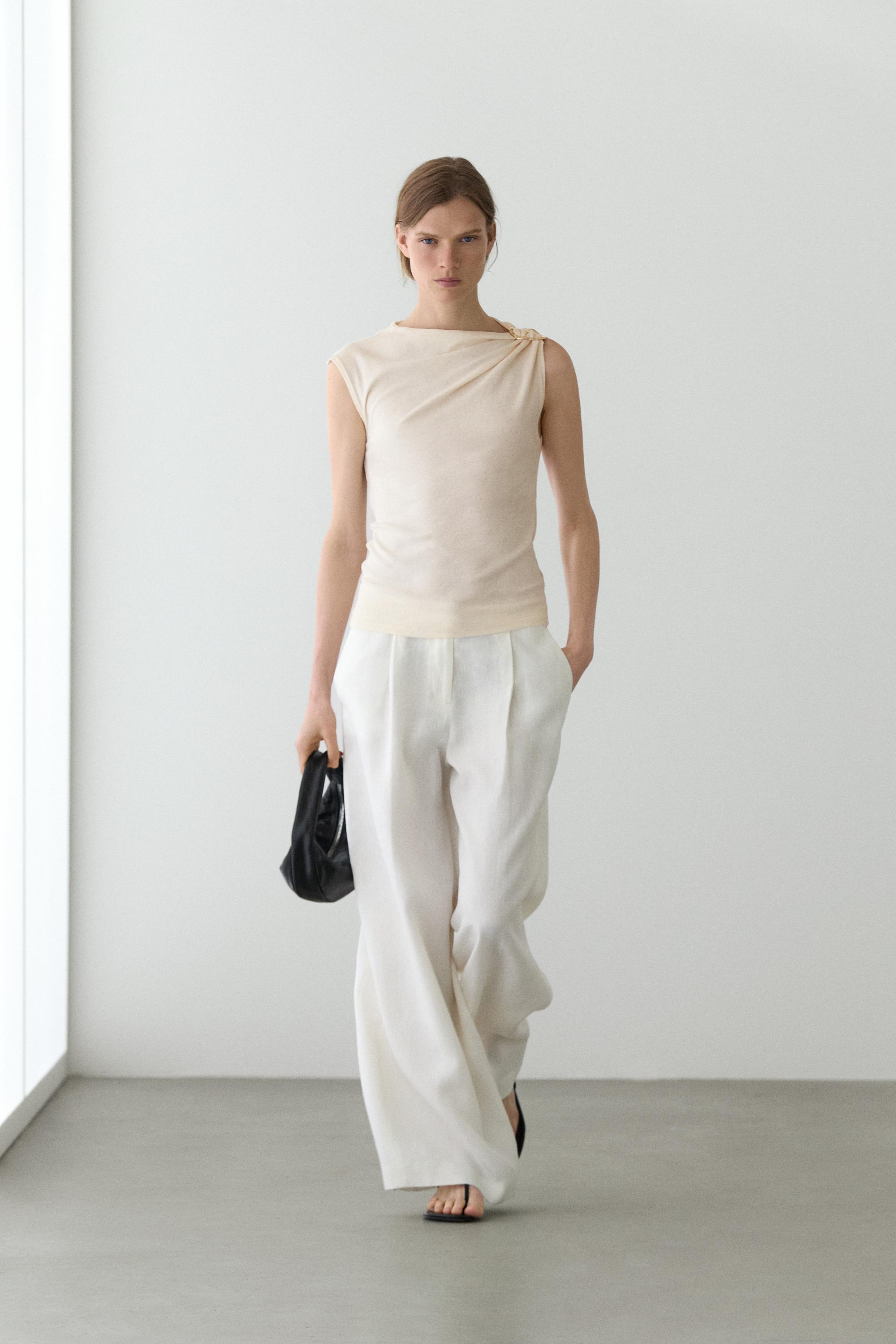 Top asimétrico detalle joya