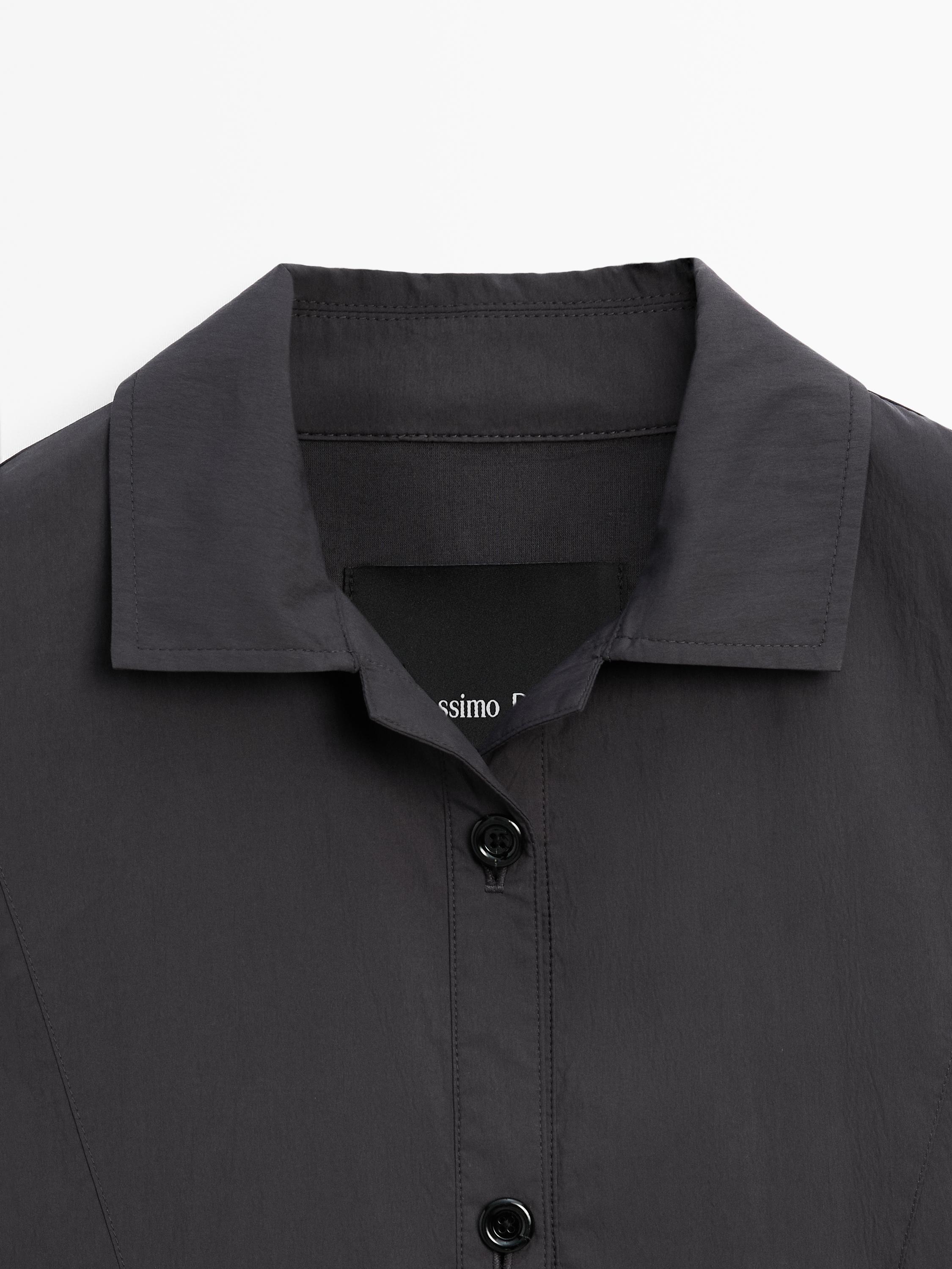 Bomber jacket with seams and gathering