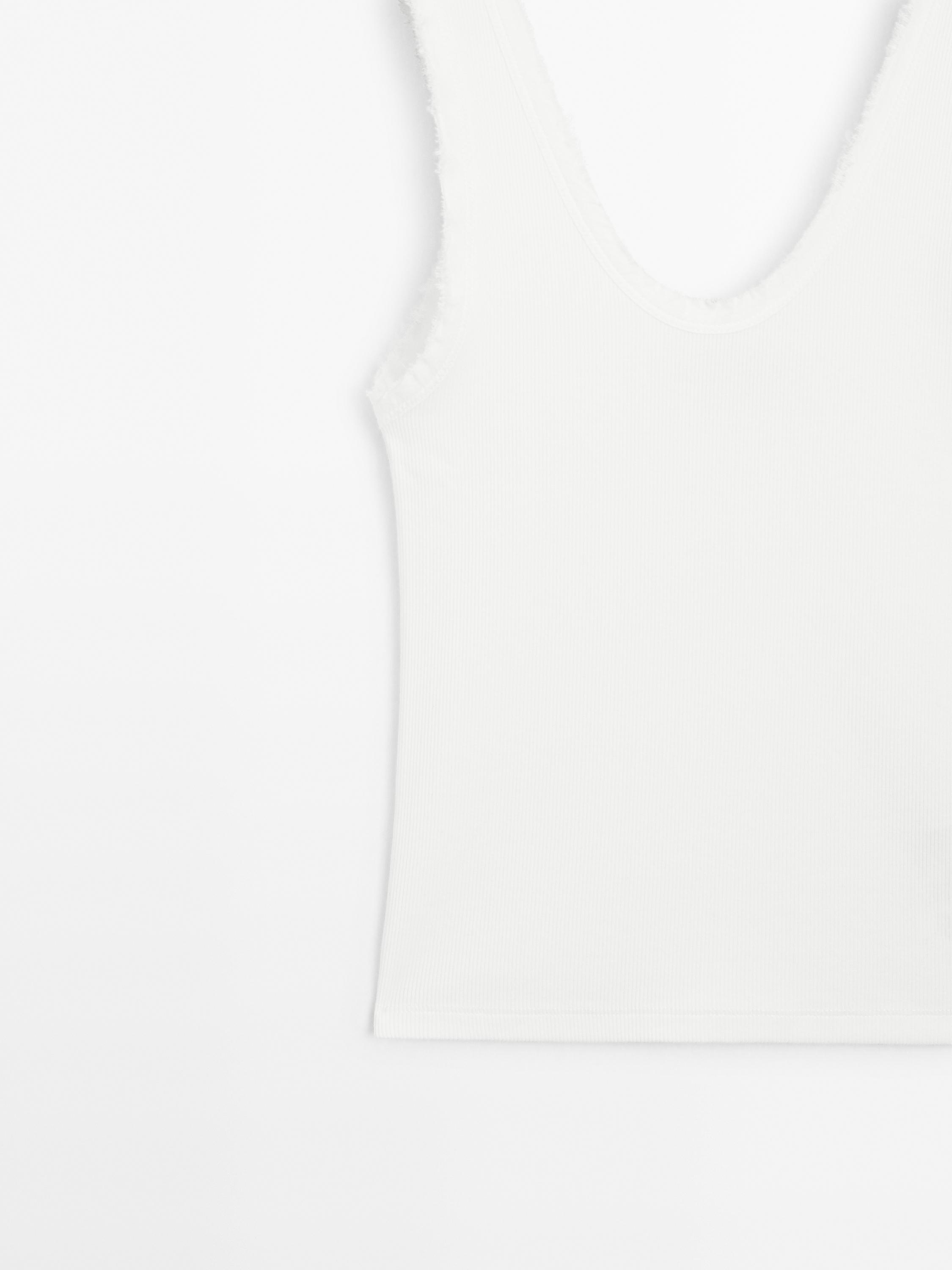 Top z mieszanki bawełny z wystrzępionym obszyciem