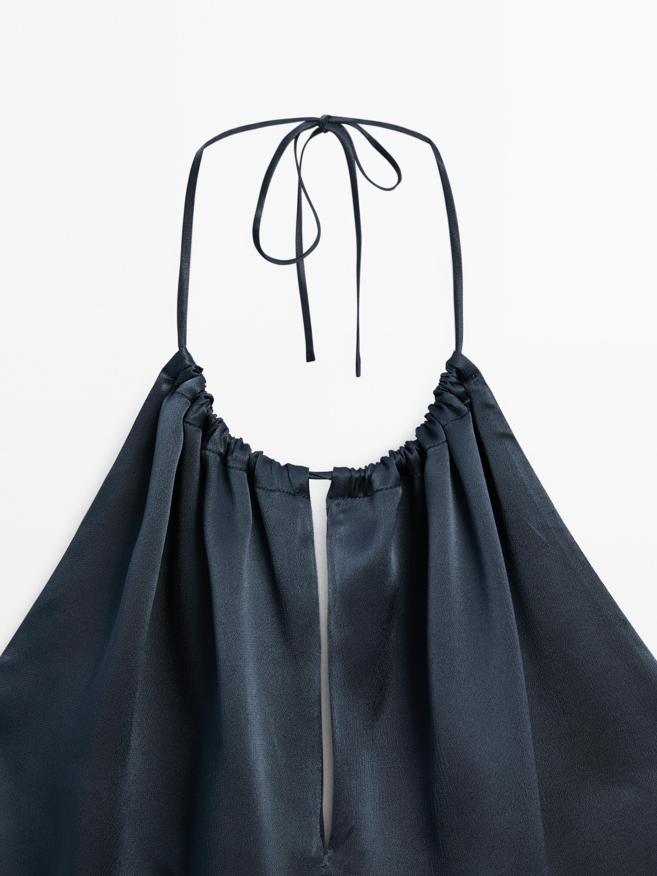 Flowing satin halter top