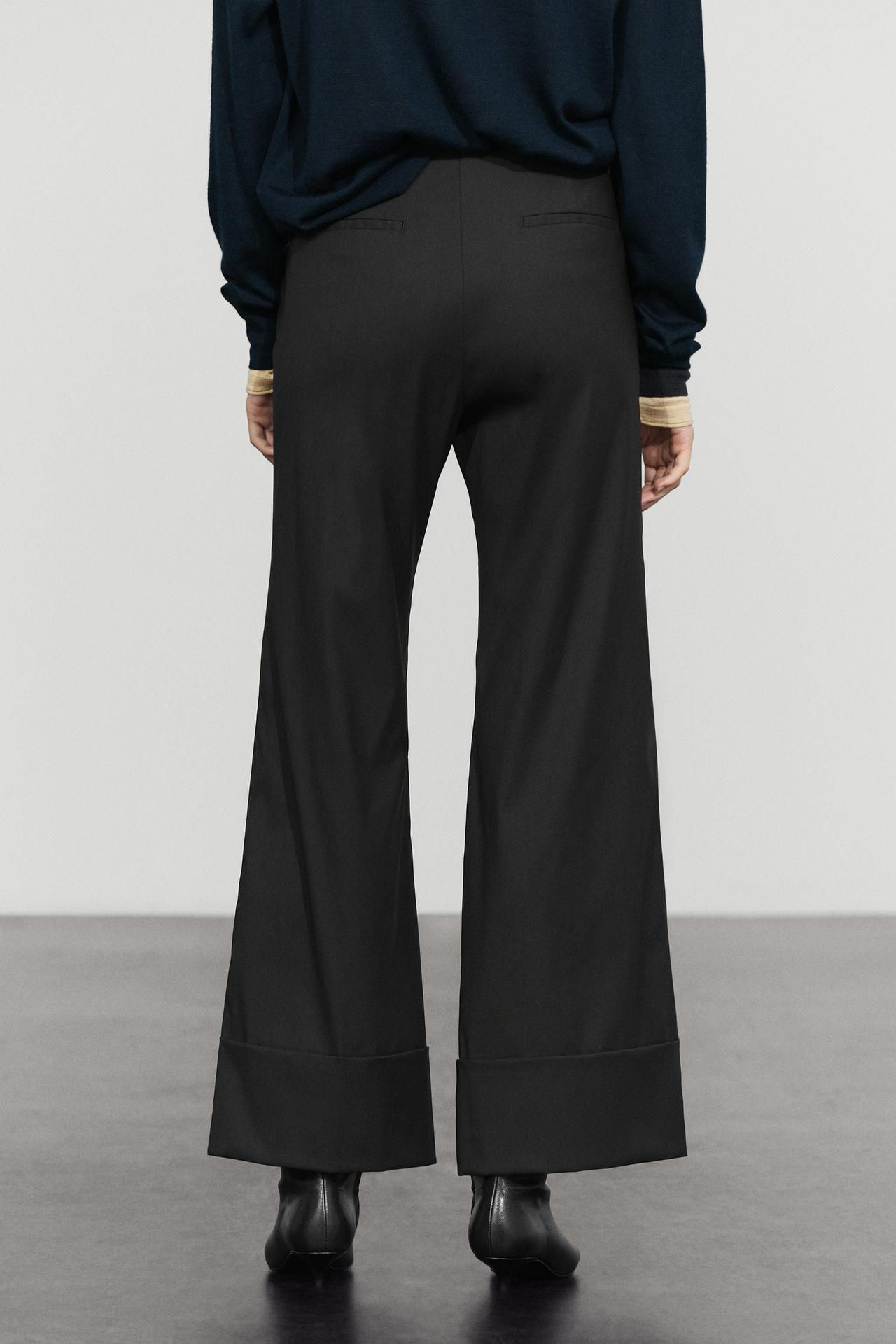 Flare fit pants with hem detail — BLACK