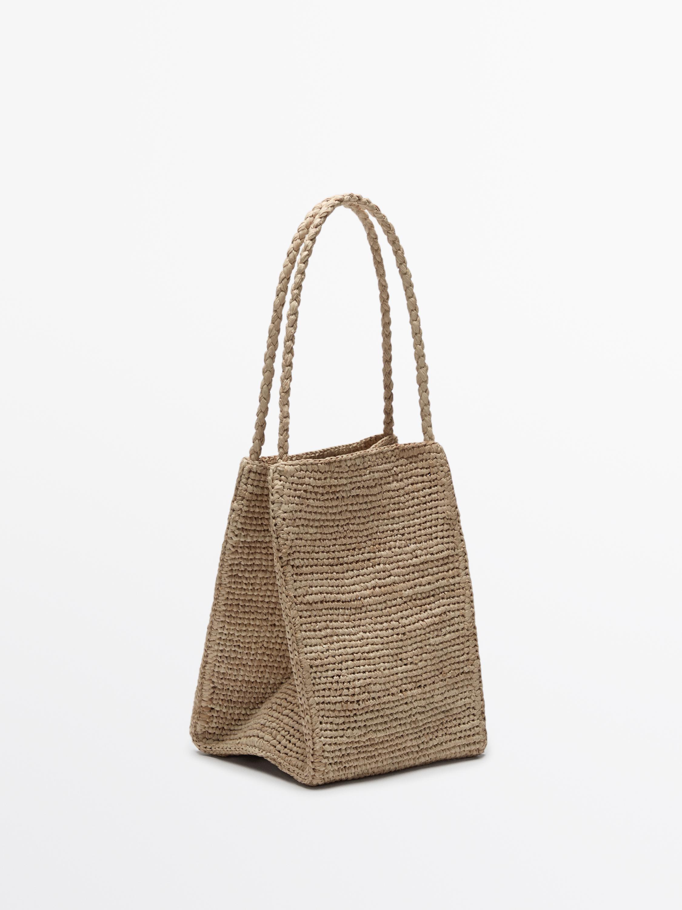 Natural raffia bucket bag