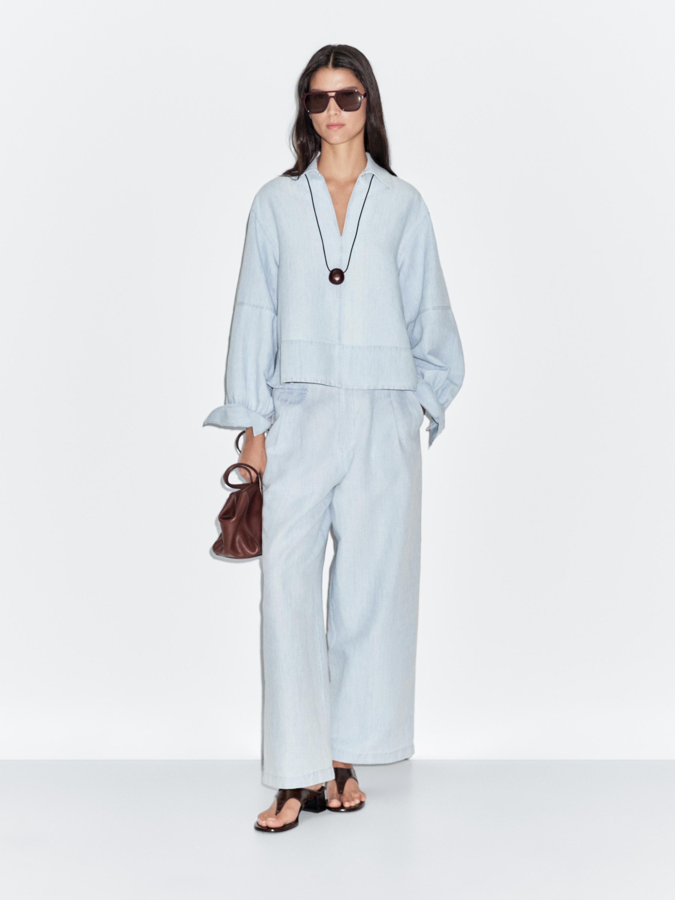 Oversize denim blouse with puff sleeves