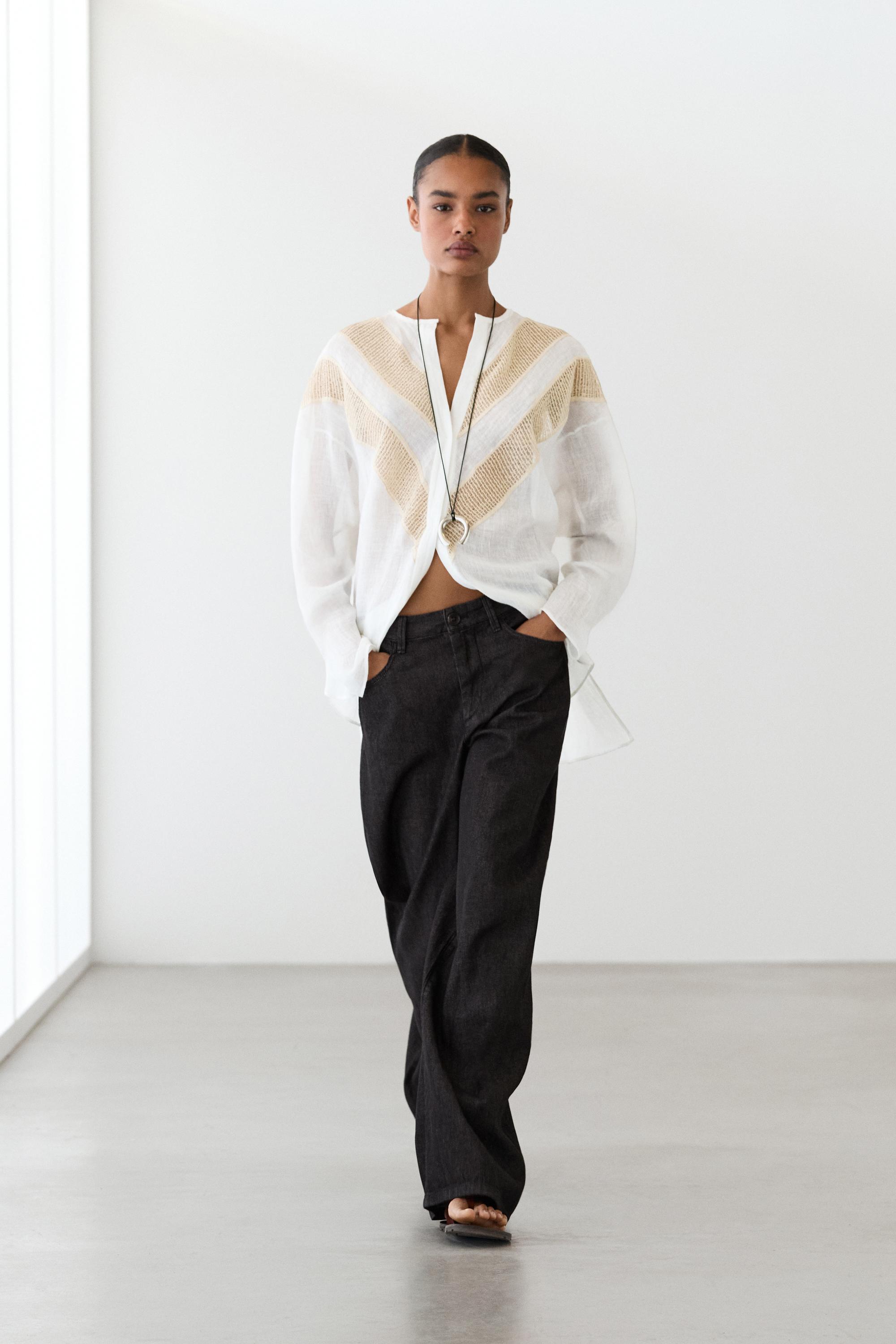 Camisa fluida detall aplicació mescla lli