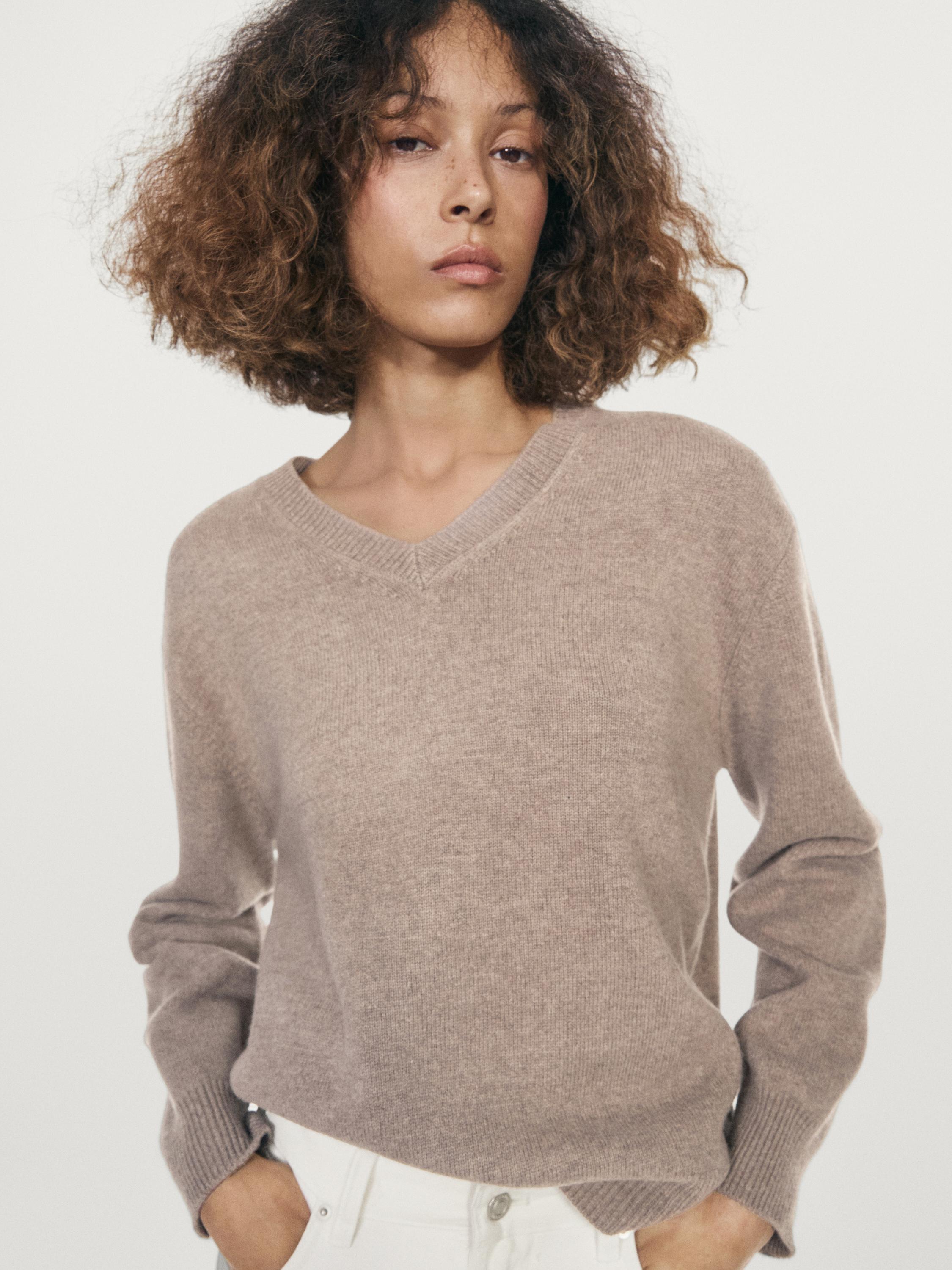 Jersey punto oversize cuello pico