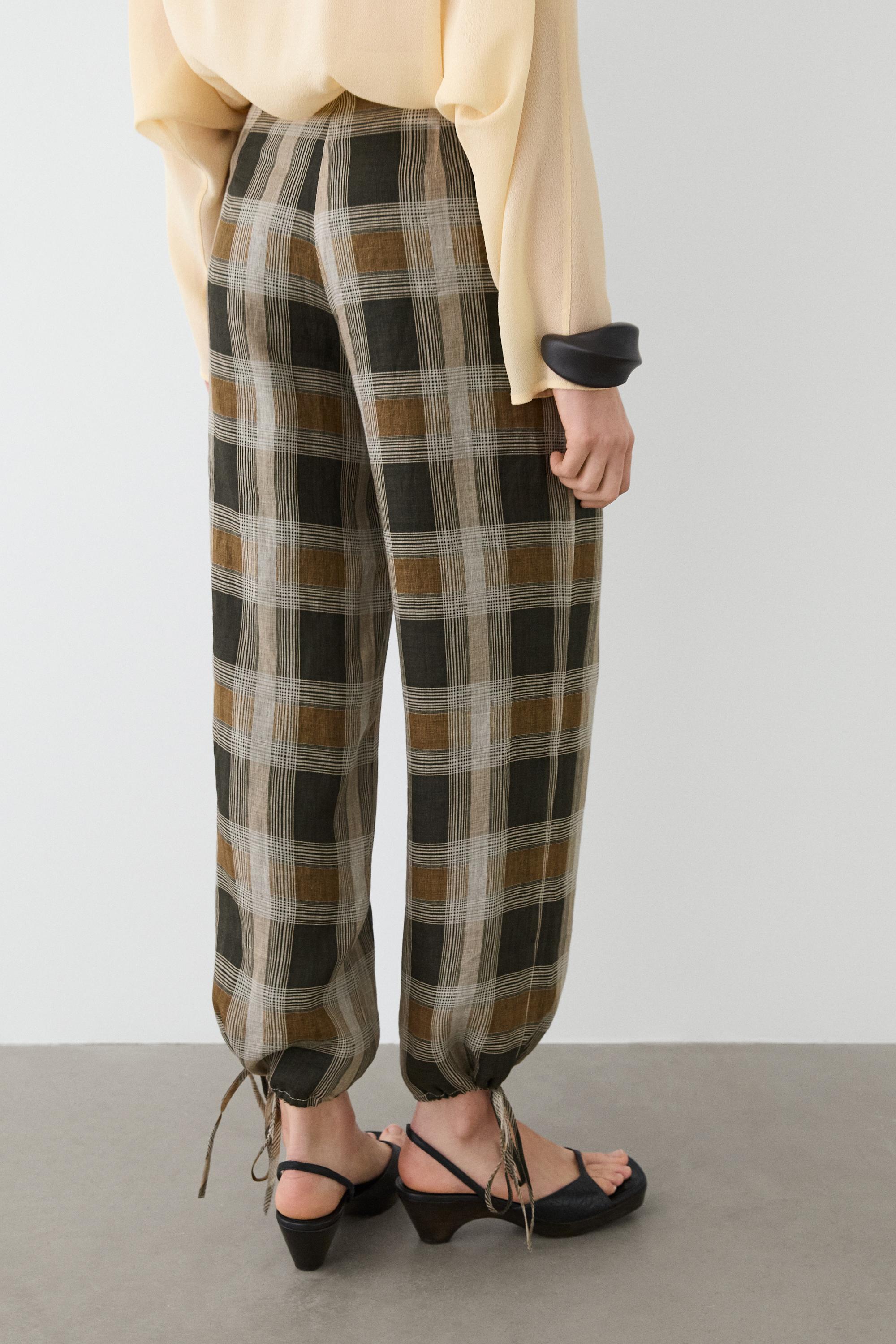 Check print sarouel trousers — BLACK