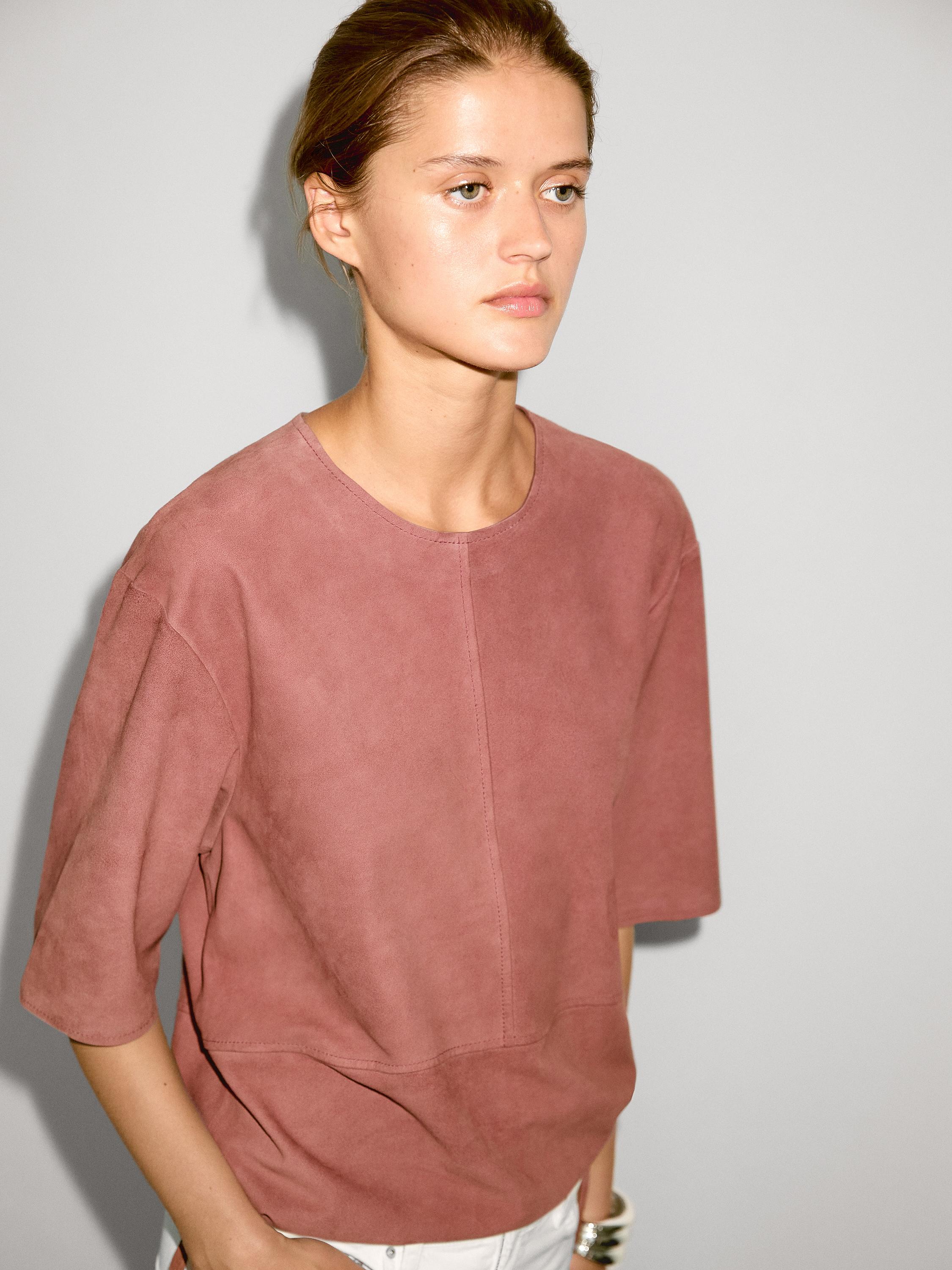 Suede leather top with strap detail